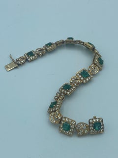 1960s European 18 carat gold, diamond and Colombian emerald bracelet