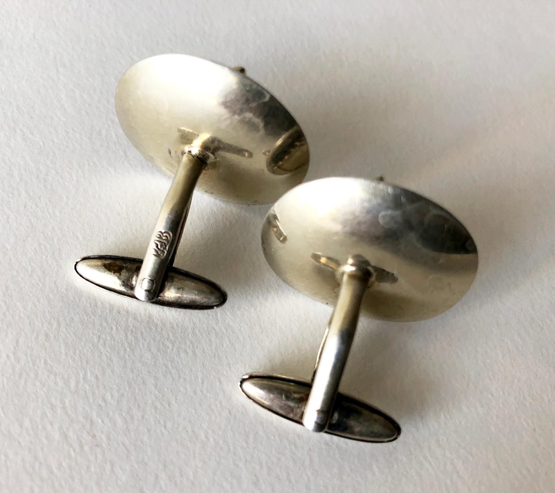European cufflinks featuring horse head relief with light gold wash and good detail, circa 1960's.  Cufflinks measure 1