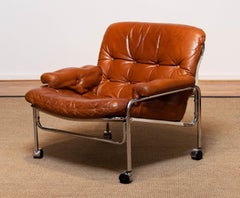 1960s Eva Lounge Chair Chrome and Aged Brown / Tan Leather by Lindlöfs Möbler 1
