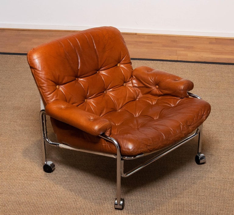 1960s Eva Lounge Chair Chrome and Aged Brown / Tan Leather by Lindlöfs Möbler 1 In Good Condition For Sale In Silvolde, Gelderland