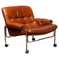 1960s Eva Lounge Chair Chrome and Aged Brown / Tan Leather by Lindlöfs Möbler 1