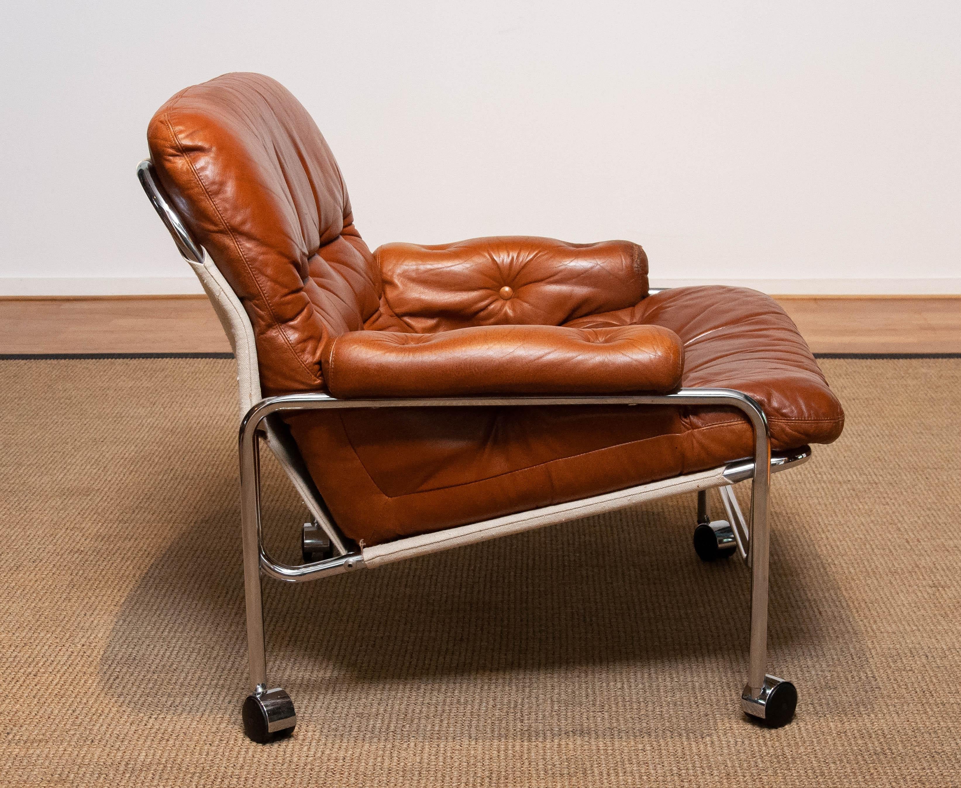 1960s Eva Lounge Chair Chrome and Aged Brown / Tan Leather by Lindlöfs Möbler  1