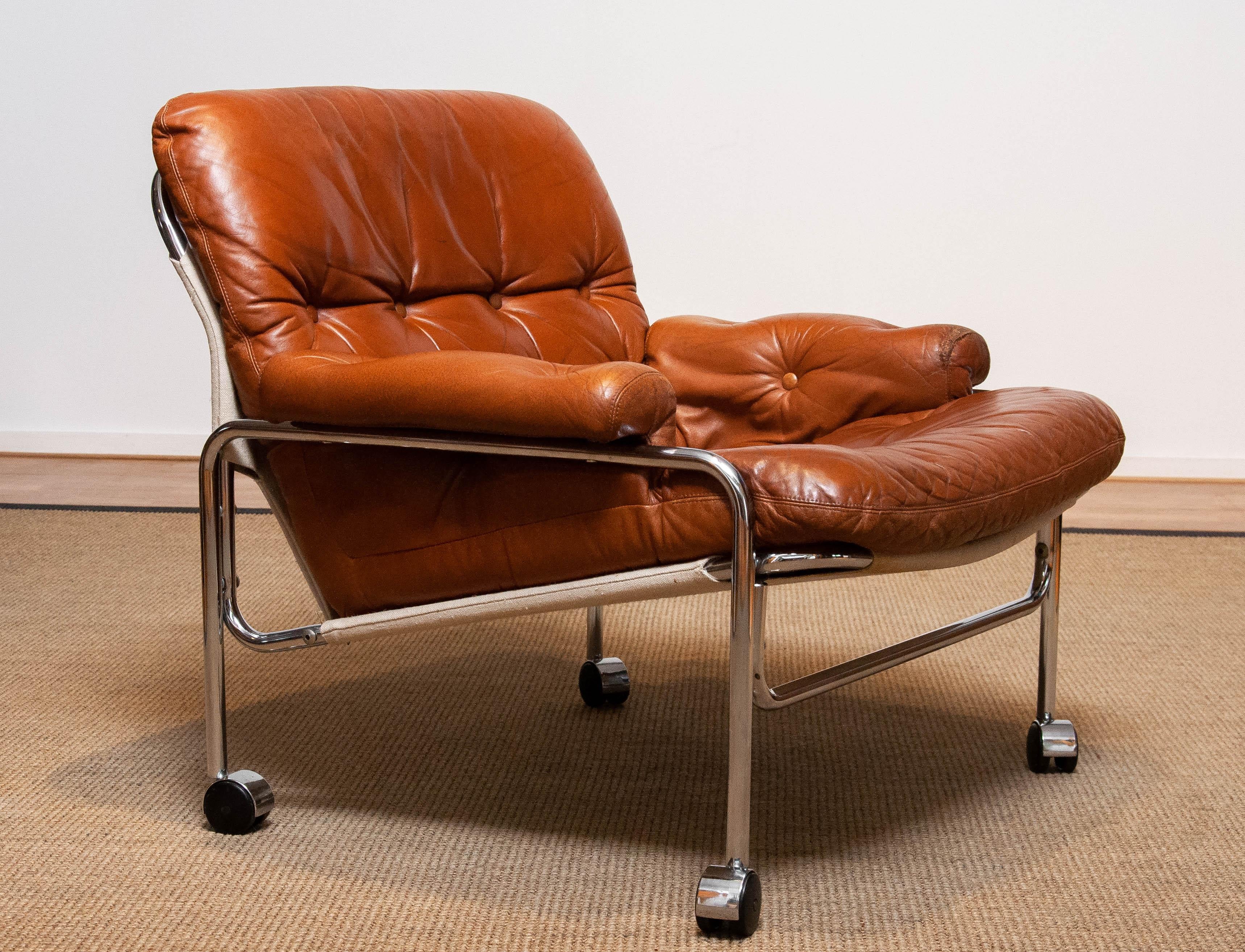 1960s Eva Lounge Chair Chrome and Aged Brown / Tan Leather by Lindlöfs Möbler  3