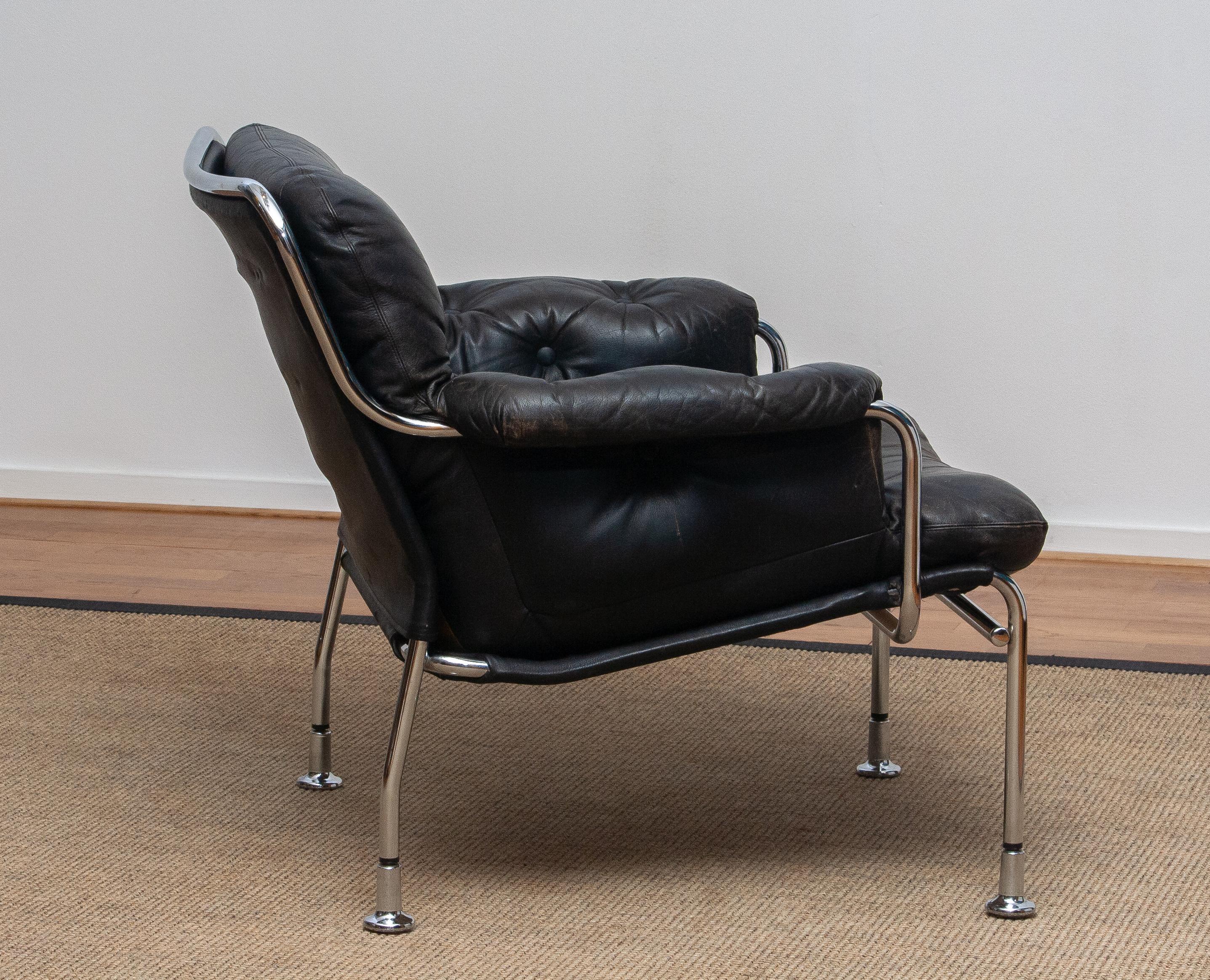 Mid-20th Century 1960s, Eva Lounge Chairs in Chrome and Aged Black Leather by Lindlöfs Möbler