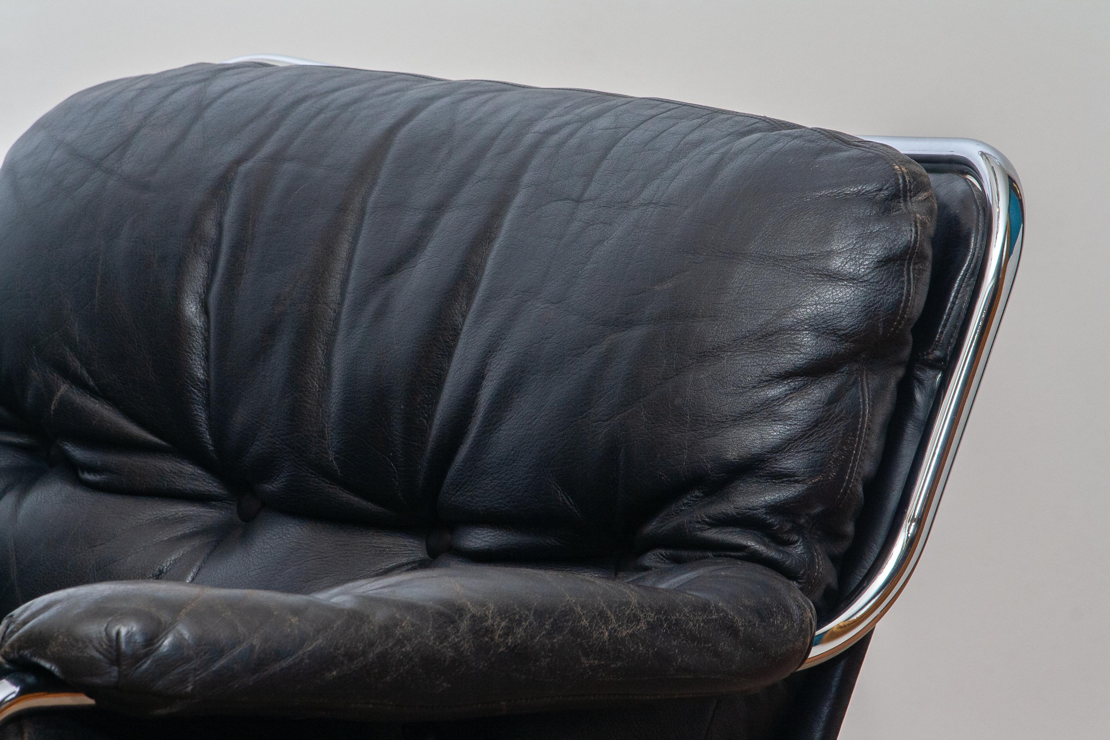 Mid-20th Century 1960s, Eva Lounge Chairs in Chrome and Aged Black Leather by Lindlöfs Möbler