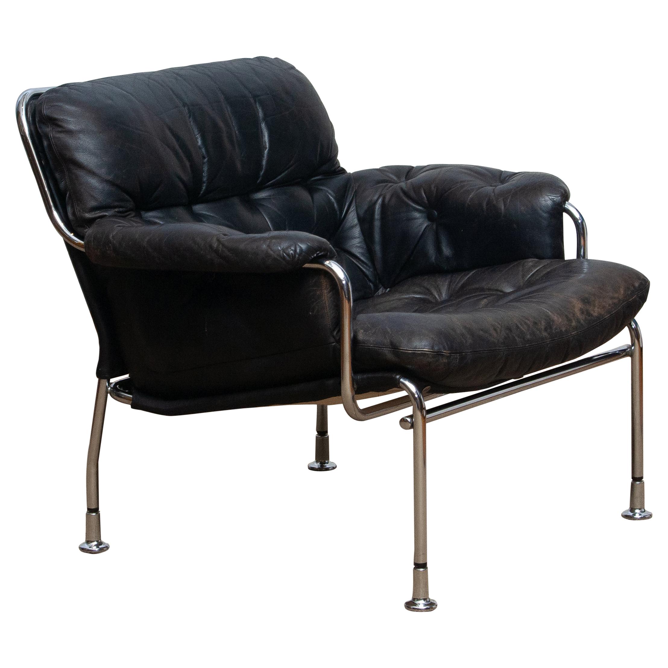 1960s, Eva Lounge Chairs in Chrome and Aged Black Leather by Lindlöfs Möbler