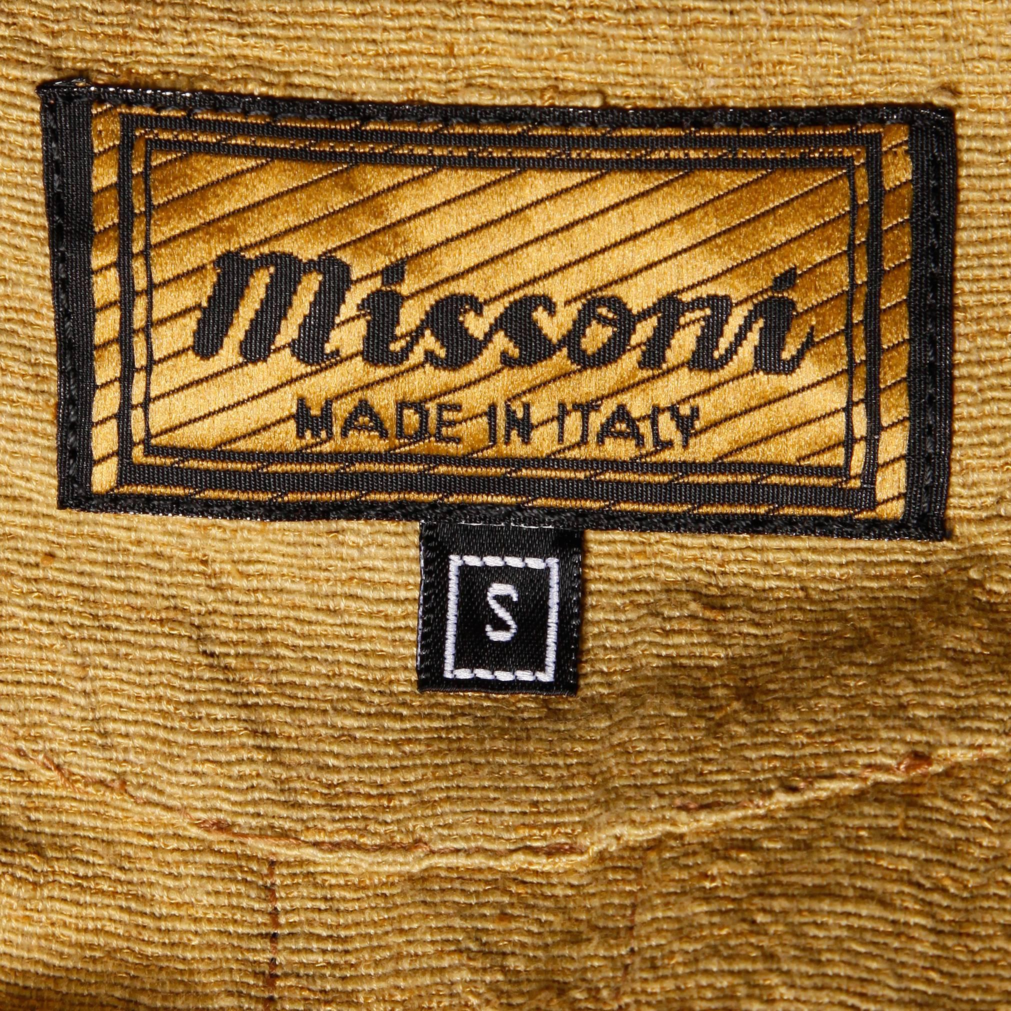 This is definitely the earliest Missoni label we have seen to date online or in person! We are dating this gorgeous dress to the very first years Ottavio and Rosita Missoni designed under the Missoni name during the early 1960s. The dress is mustard