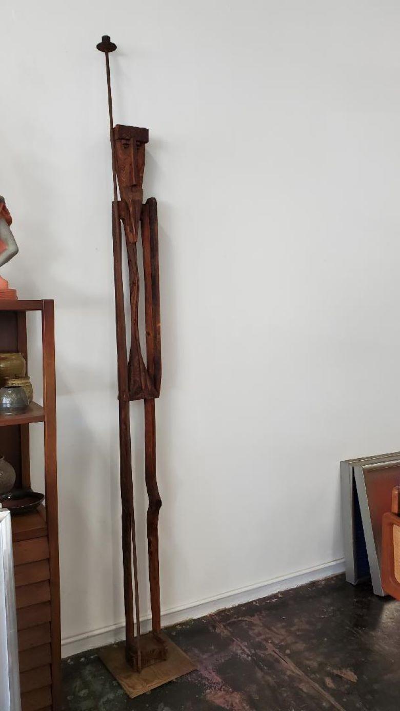 1960s Extremely Tall And Thin Witco Don Quixote Wooden Cedar Sculpture. Brutal Mid Century Wooden Sculpture Stands 85 Inches Tall On A Wooden 12 x 12 Platform. This Listing Is Of A Wooden Sculpture Only, The Tall Lance Like Object (My Tall Vintage