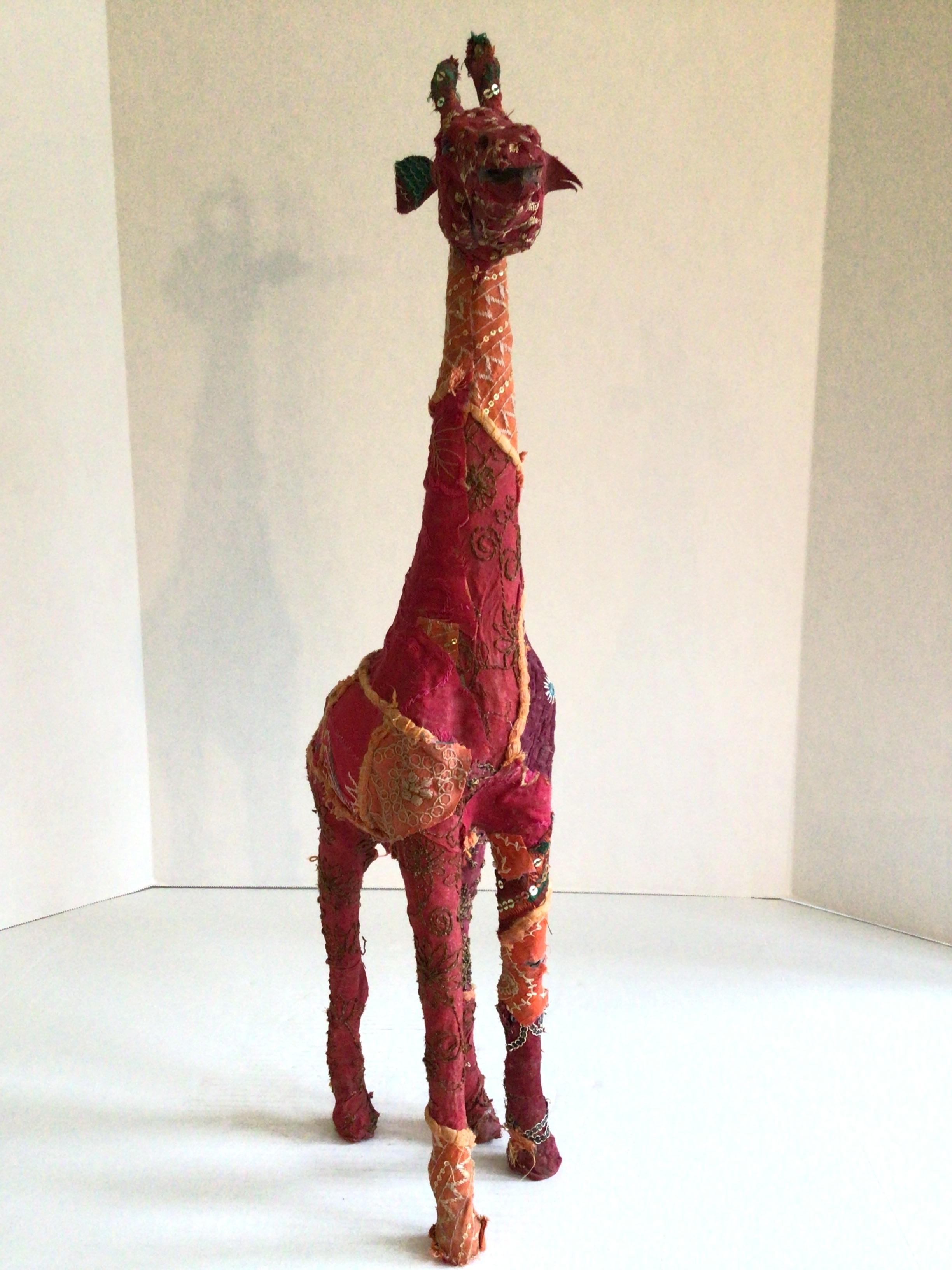 1960s Fabric Wrapped Giraffe Sculpture With Embroidered Embellishments
Hard material underneath (pressed pulp)
Embroidered embellishments add further detail to this handmade sculpture