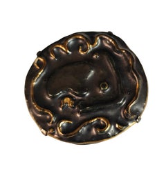 1960s face outline black and gold ceramic brooch