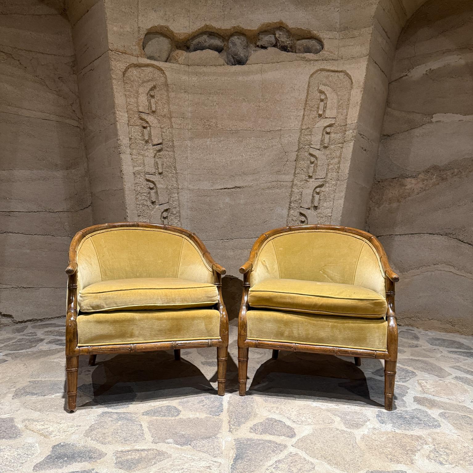 1960s Faux Bamboo Lounge Chairs Century Furniture Chair Company Hickory NC
Retains original label 
30 h x 26.6 w x 29.5 d x seat 19, armrest 23
Please note restoration option:
chairs are currently being reupholstered and can be completed in your
