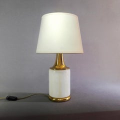 Lampada da tavolo a due luci in vetro artistico di Murano e ottone, anni '60, F. Fabbian, base in vetro.