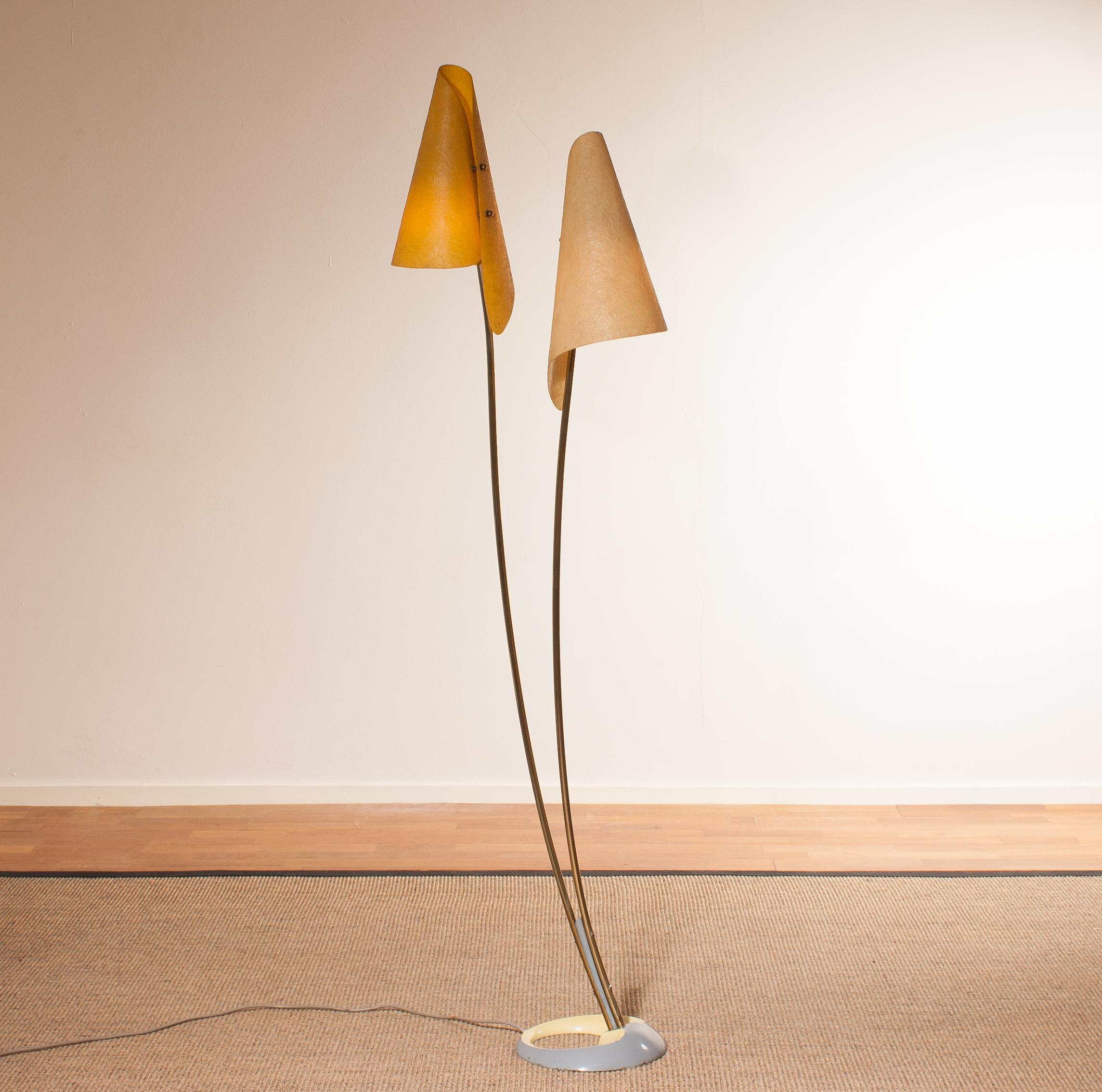Very rare and beautiful floor lamp with two fiberglass shades and a wonderful design stand.
This very nice design is made in Germany.
It is in a very good and working condition.
Period 1960s.
Dimensions: H 164 cm, W 46 cm, D 25 cm.
