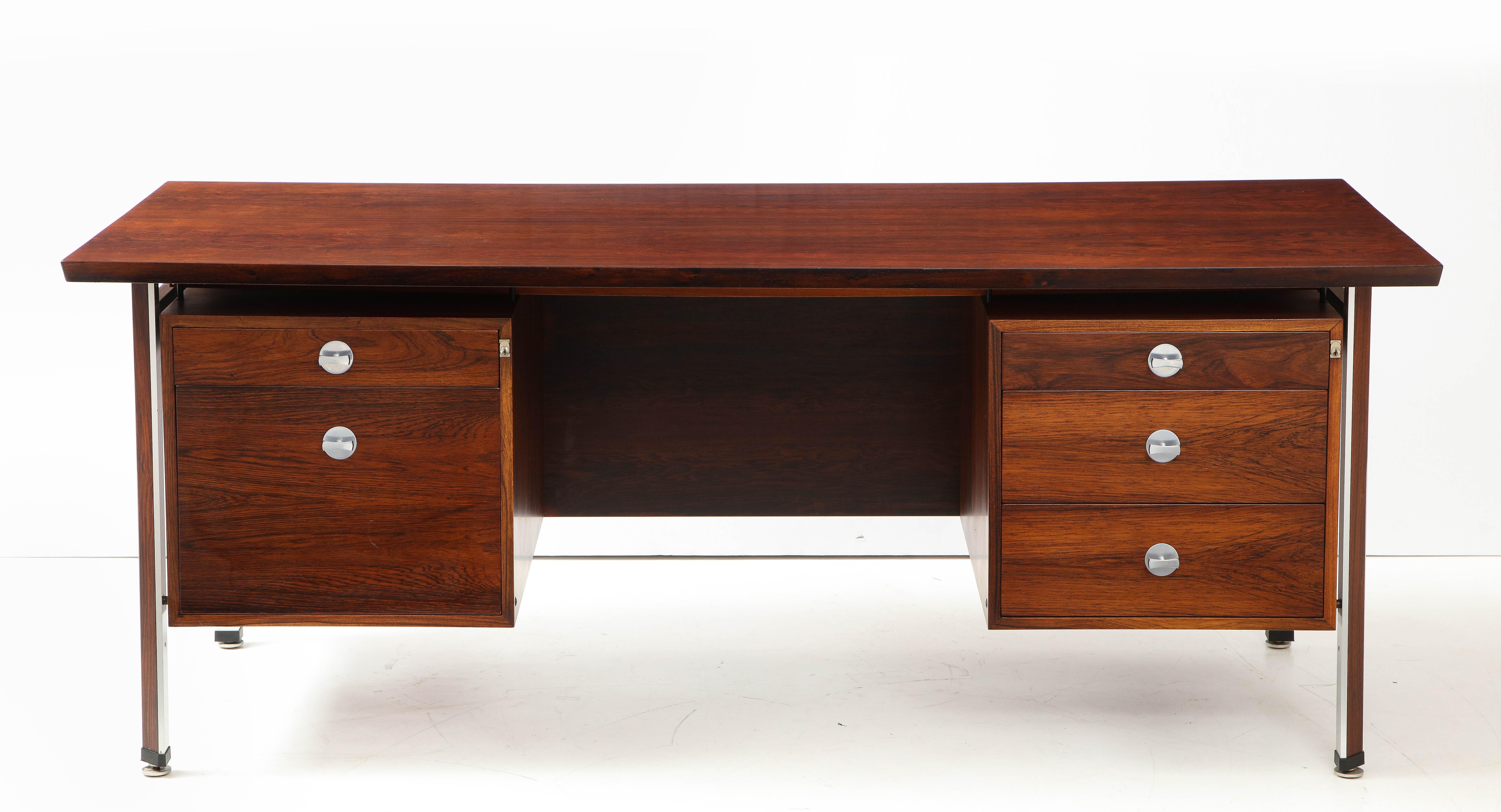 Stunning 1960s Danish rosewood technocrat executive desk designed by Finn Juhl for France & Son.
with 5 drawers and chrome hardware.