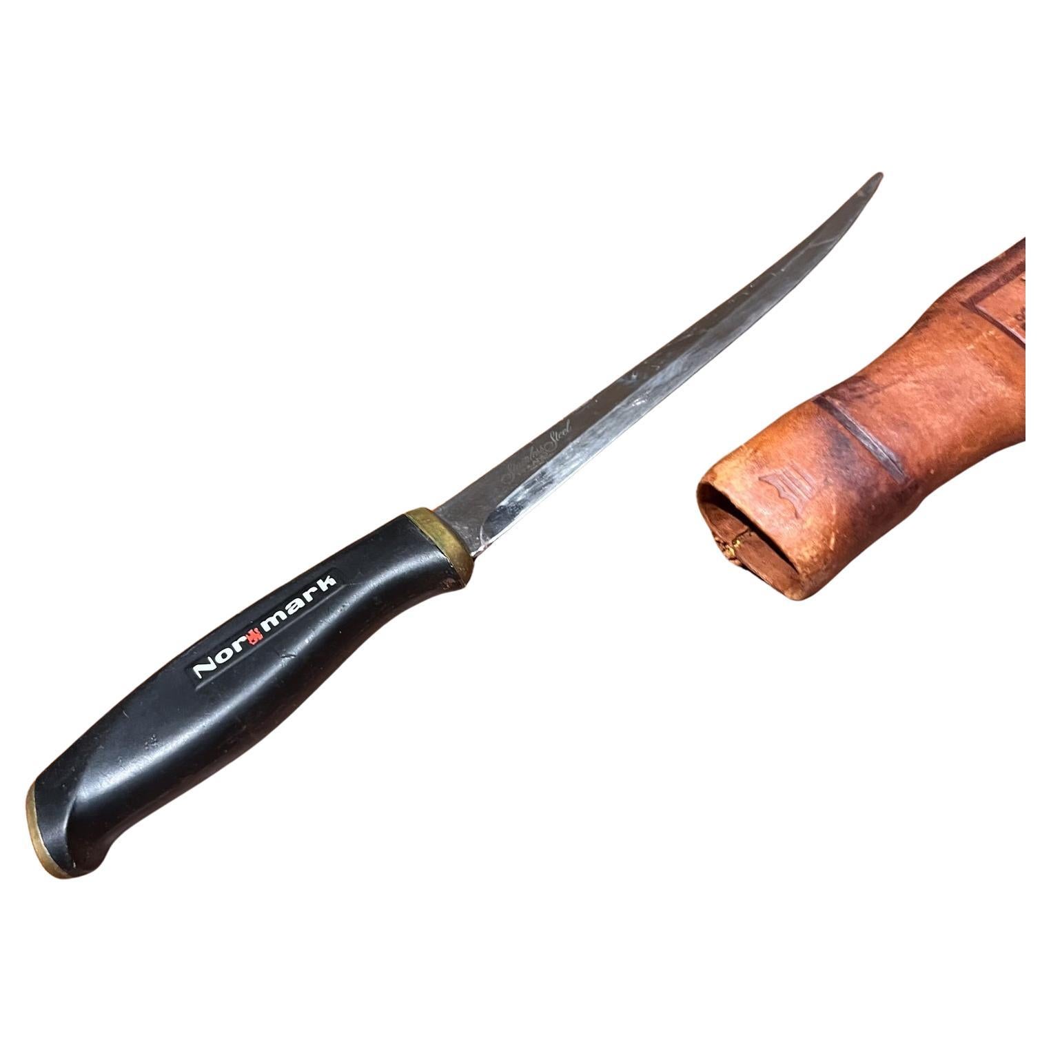 1967 Fiskars Normark stainless steel knife from Finland
leather sheath
Vintage Fixed Blade Fillet Fish Knife
11.13 long x 1.5 tall x 1 thick
Vintage unrestored condition
Refer to images for condition.