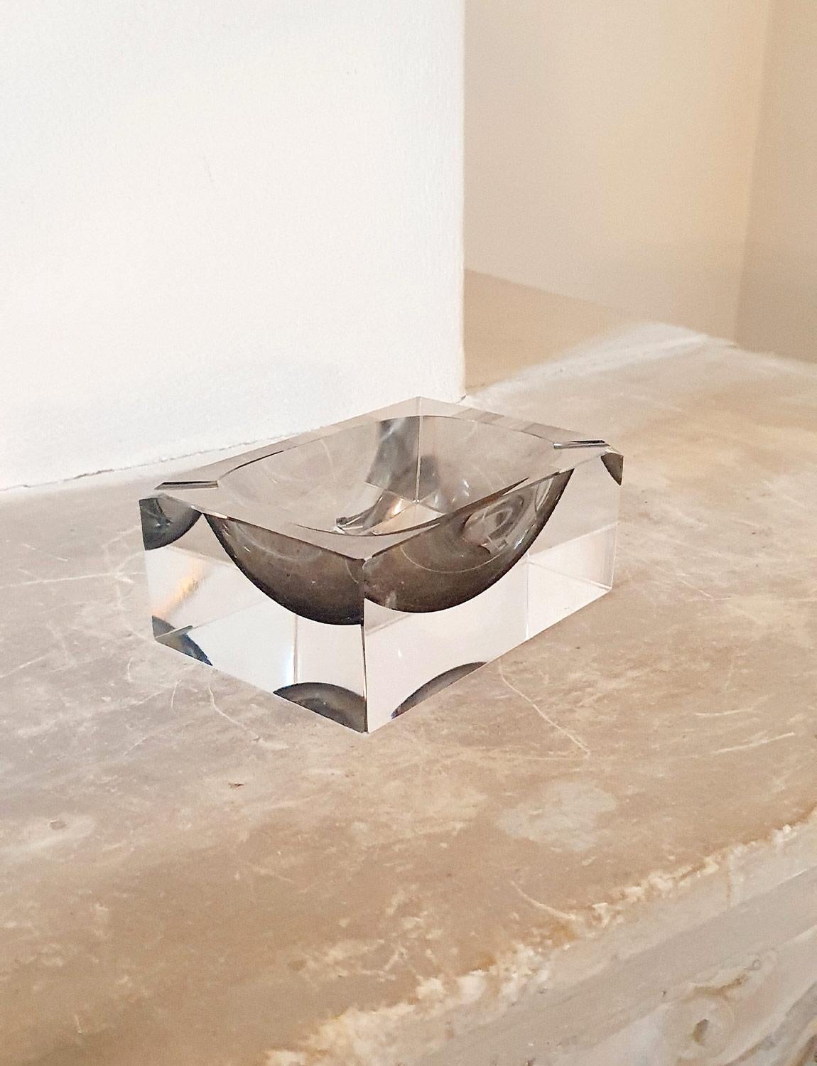 This Flavio Poli hand-blown Murano glass bowl in soft grey is submerged into rectangle of clear glass. It can be used either as a decorative bowl or ashtray. Hand-blown in Murano in the 1960s and found in a private home in Rome.