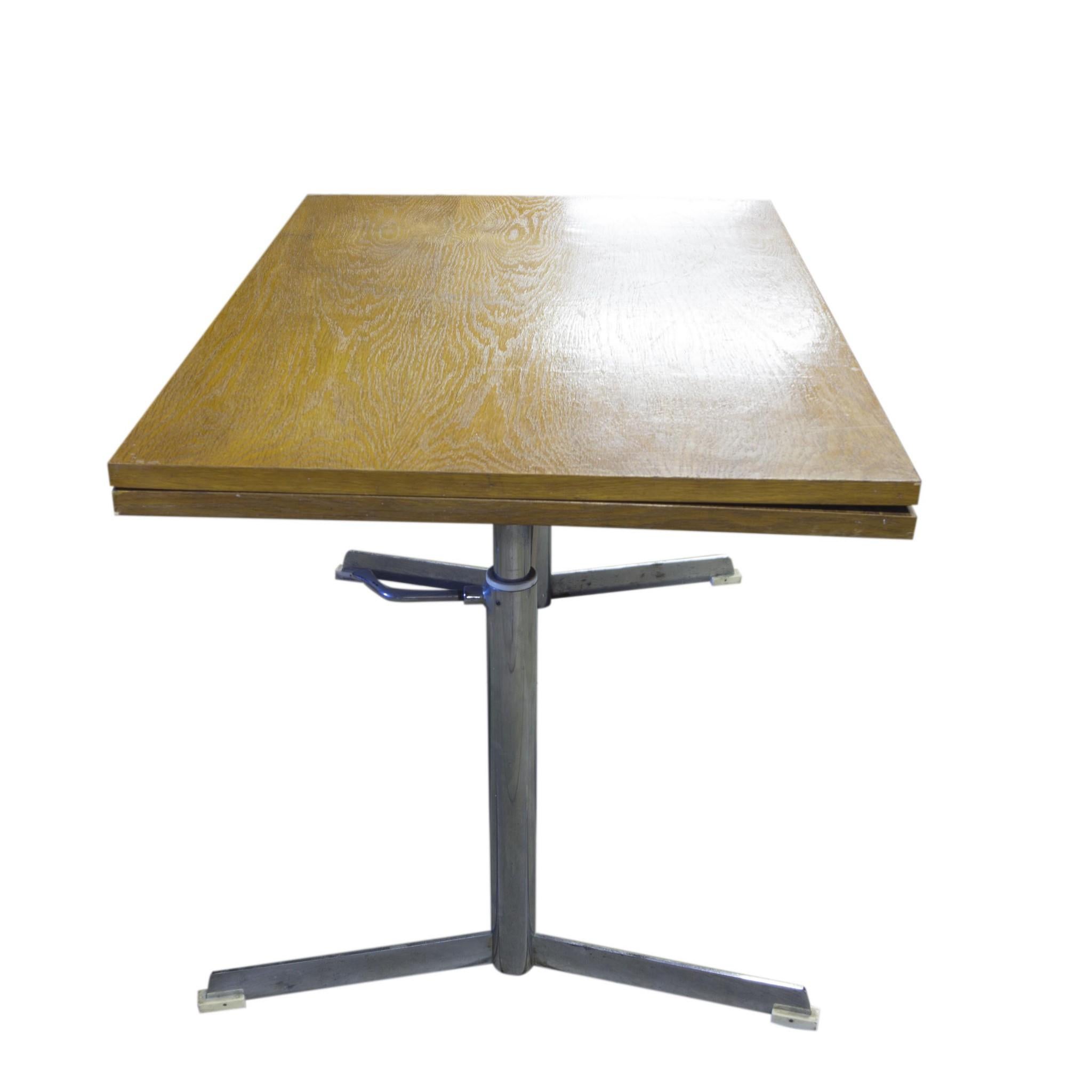 Vintage folding dining table, 1960s, chrome metal base, Middle Europe. Beechwood. Traces of wear and tear commensurate with age, it can show some signs of age through scuffs, faded finishes or small visible repairs. Overall in good vintage