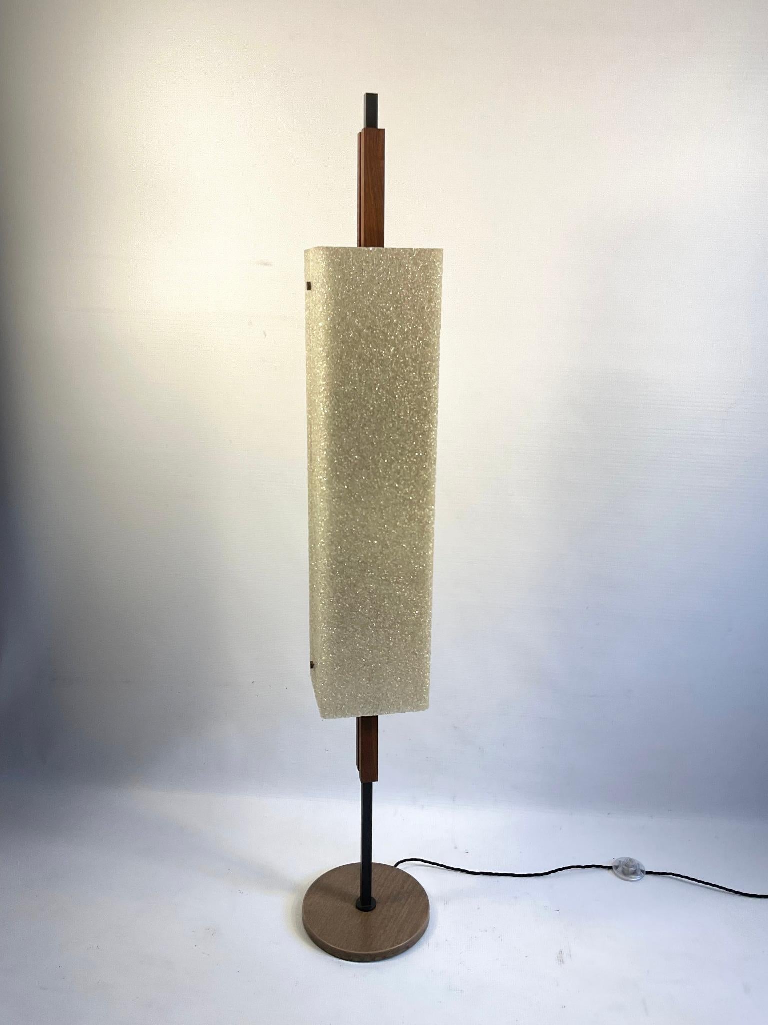 1960s Floor Lamp in granite resin and teak attributed to Maison Arlus with foot switch.
