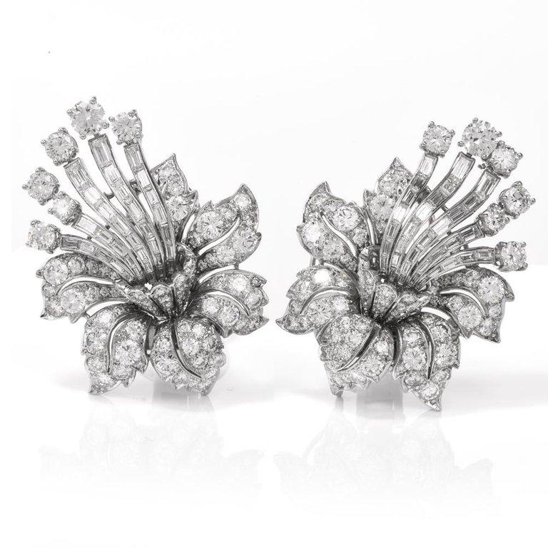 These 1960's Vintage earrings of unmatched elegance are crafted in platinum, weighing approx. 46.7 grams and measuring 2.5 inches long by 1.1 inches wide. These earrings simulate enchanting floral bouquet motif profiles with posts and clip-backs,