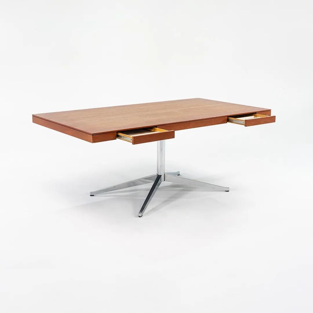 This is a Florence Knoll Executive Desk, Model 2485, initially designed by Florence Knoll for Knoll in 1954. This particular example dates to the 1960s based on the original 320 Park Avenue label, where Knoll had their showroom during that time. It