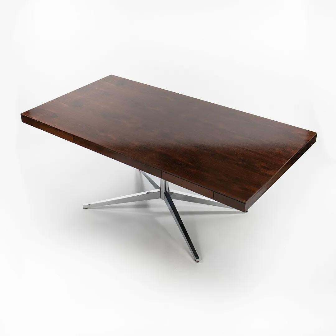 This is a Florence Knoll Partners Desk or Executive Table, Model 2485, designed in 1961. It was manufactured in the early 1960s by Knoll International based on the 320 Park Avenue label, where their showroom was during that time. It features a