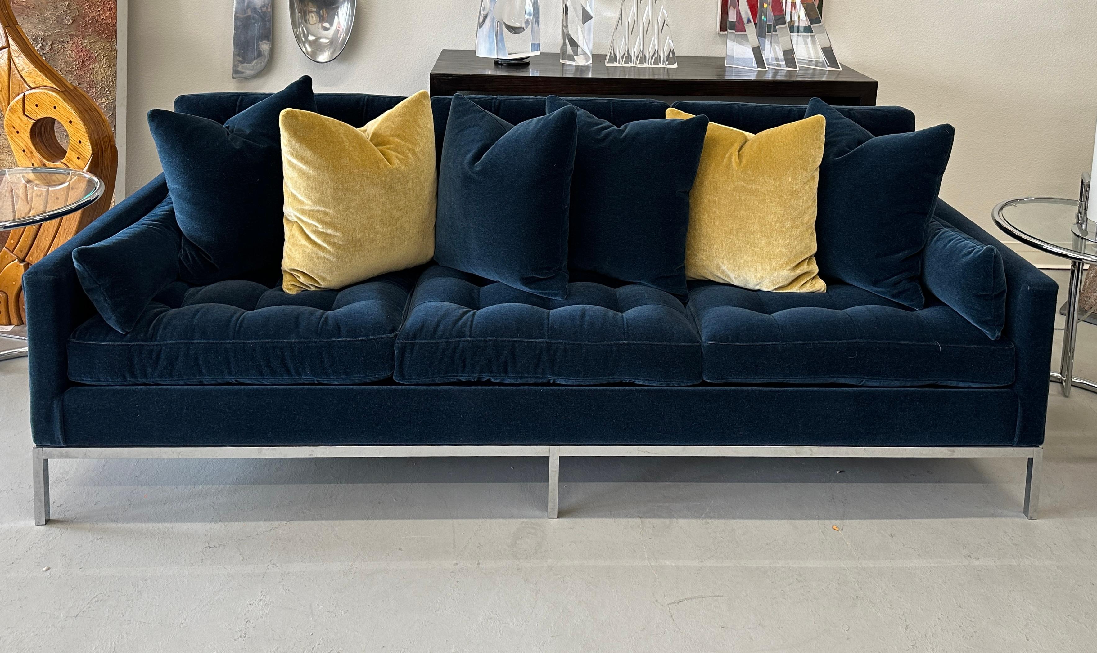 A stunning vintage 1960s Florence Knoll sofa that we had redone and reupholstered in a beautiful Kravet wool mohair. Color is called indigo blue. A rich navy color. We had 6 extra back pillows and 2 side cushions made at the same time. The sofa is
