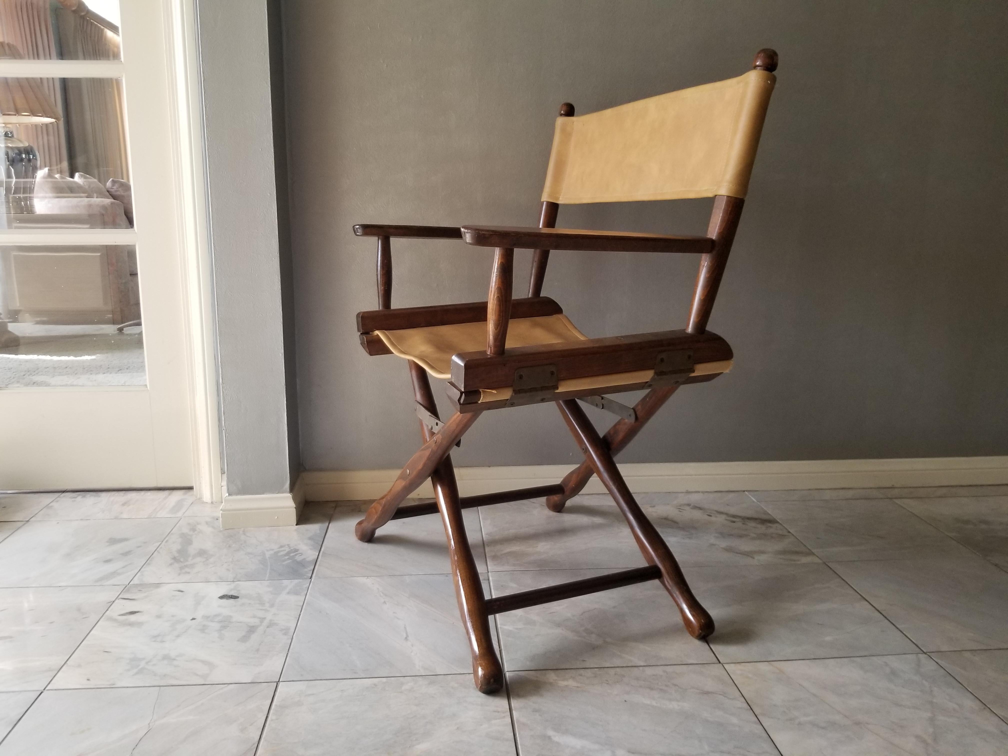 Director's Chair
1960s DIRECTORS Chair by Gold Medal Folding Furniture Company Racine WI
Gold Medal Camp Furniture
Original maker's metal tag retained.
Walnut Frame -Contoured Legs- Brass Hardware - Compact and Lightweight
Director- Safari Style