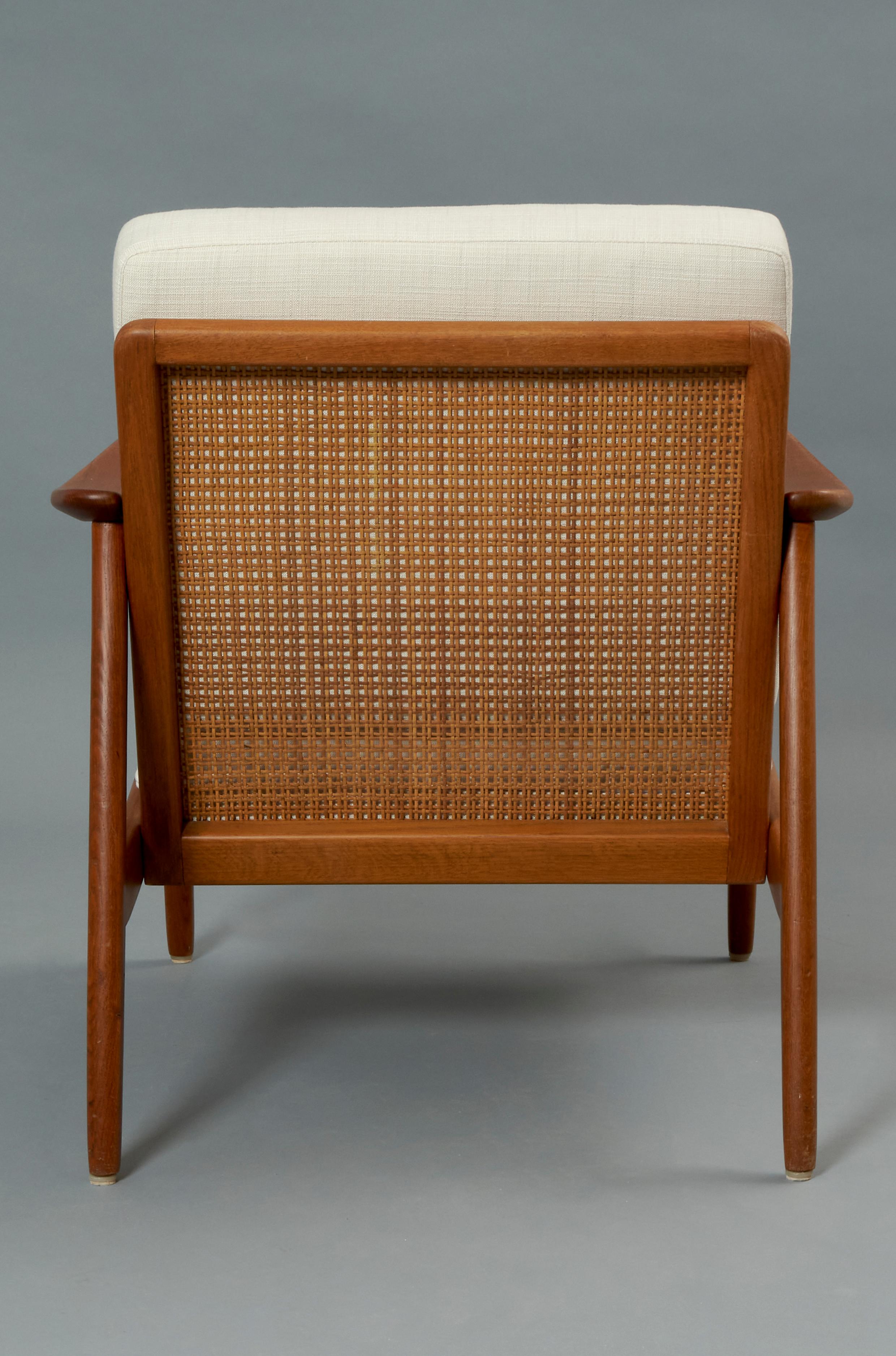 Swedish 1960s Folke Ohlsson Teak and Rattan Armchair For Sale