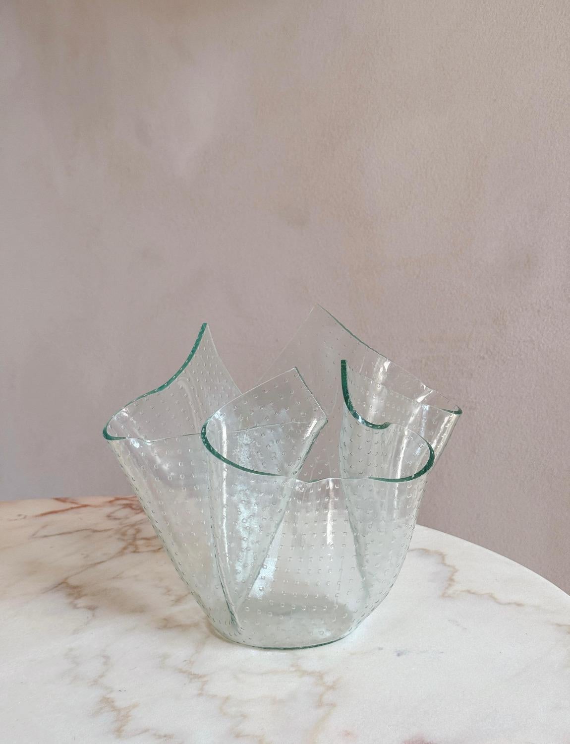 A rare spotted Fontana Arte 1960s 'Tissue Vase'. The glass is wonderfully folded to create the iconic 'cartoccio' vase but this piece is particularly special due to its unusual spotted indentations.