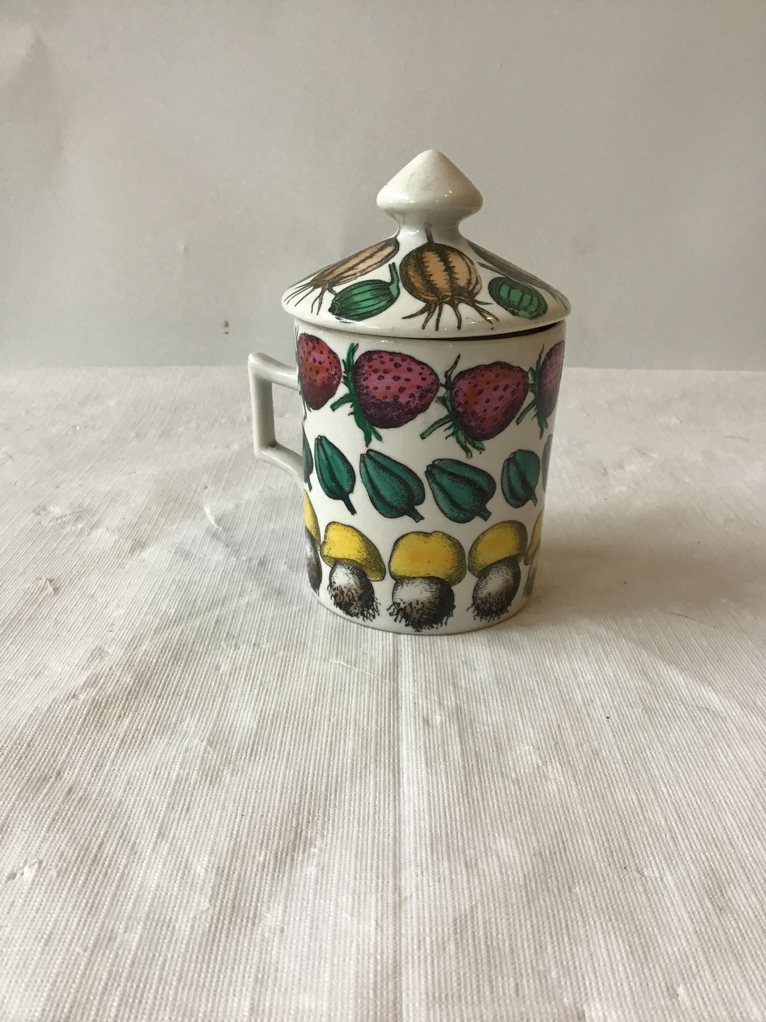 1960s Fornasetti Giostra Di Frutta mug with lid.