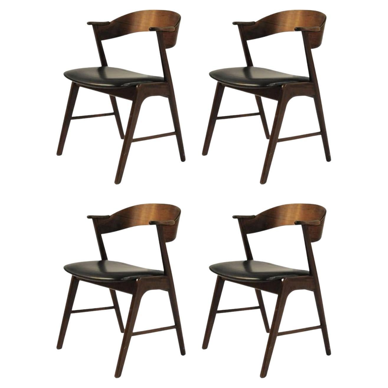 1960s Quatre chaises de salle à manger en palissandre danois entièrement restaurées tapisserie sur mesure