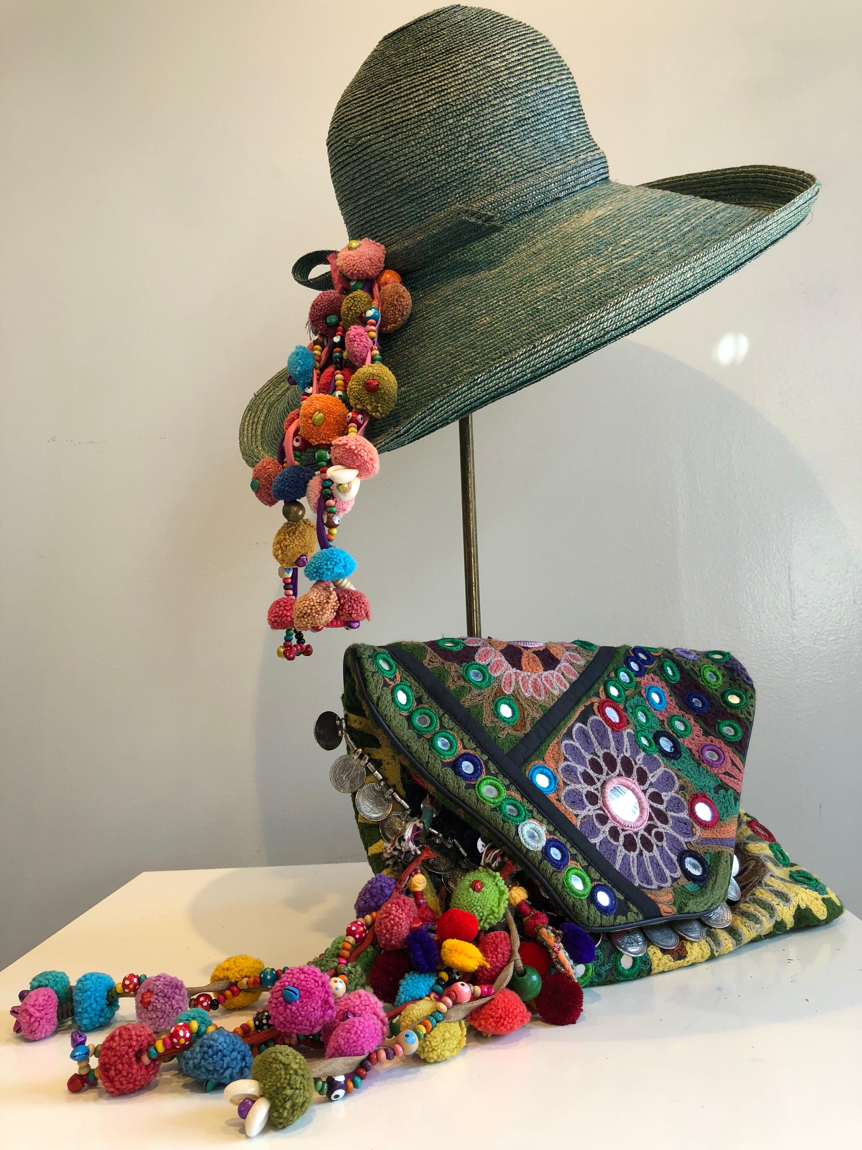 1960s Frank Olive Jade Green Straw Hat & Moroccan Textile Boho Clutch. This 2-piece set starts out with a superb Frank Olive hat in an unusual color and adds a splash of Moroccan-style pom-pom, coin trim and mirror ornamentation on the hat and