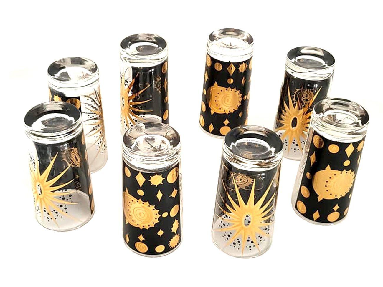 1960s Fred Press Eclipse sunburst glasses, black ,22k gold, set of 8

Offered for sale is a set of eight Fred Press Eclipse Sunburst glasses in black and 22K gold. These gorgeous vintage highball cocktail glasses are a midcentury Classic. Made by