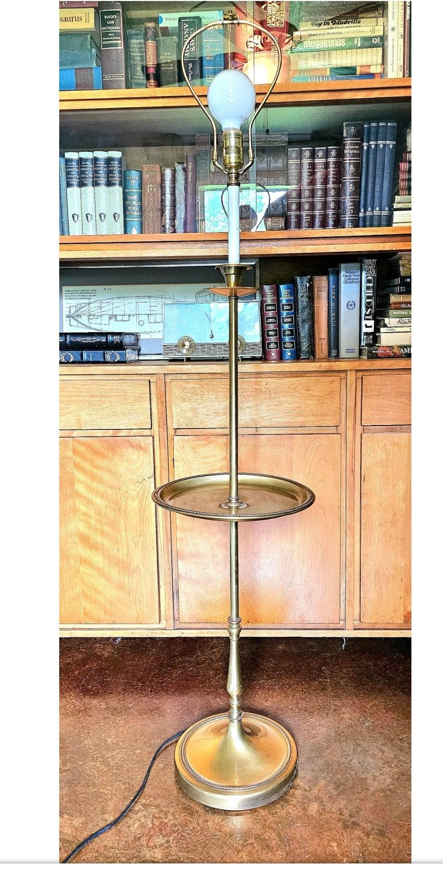 Born in Chicago 
1960s Frederick Cooper brass table floor lamp.
Classic mid century styling.
Table is functional and holds weight.
No shade included
Hollywood regency 
Art deco