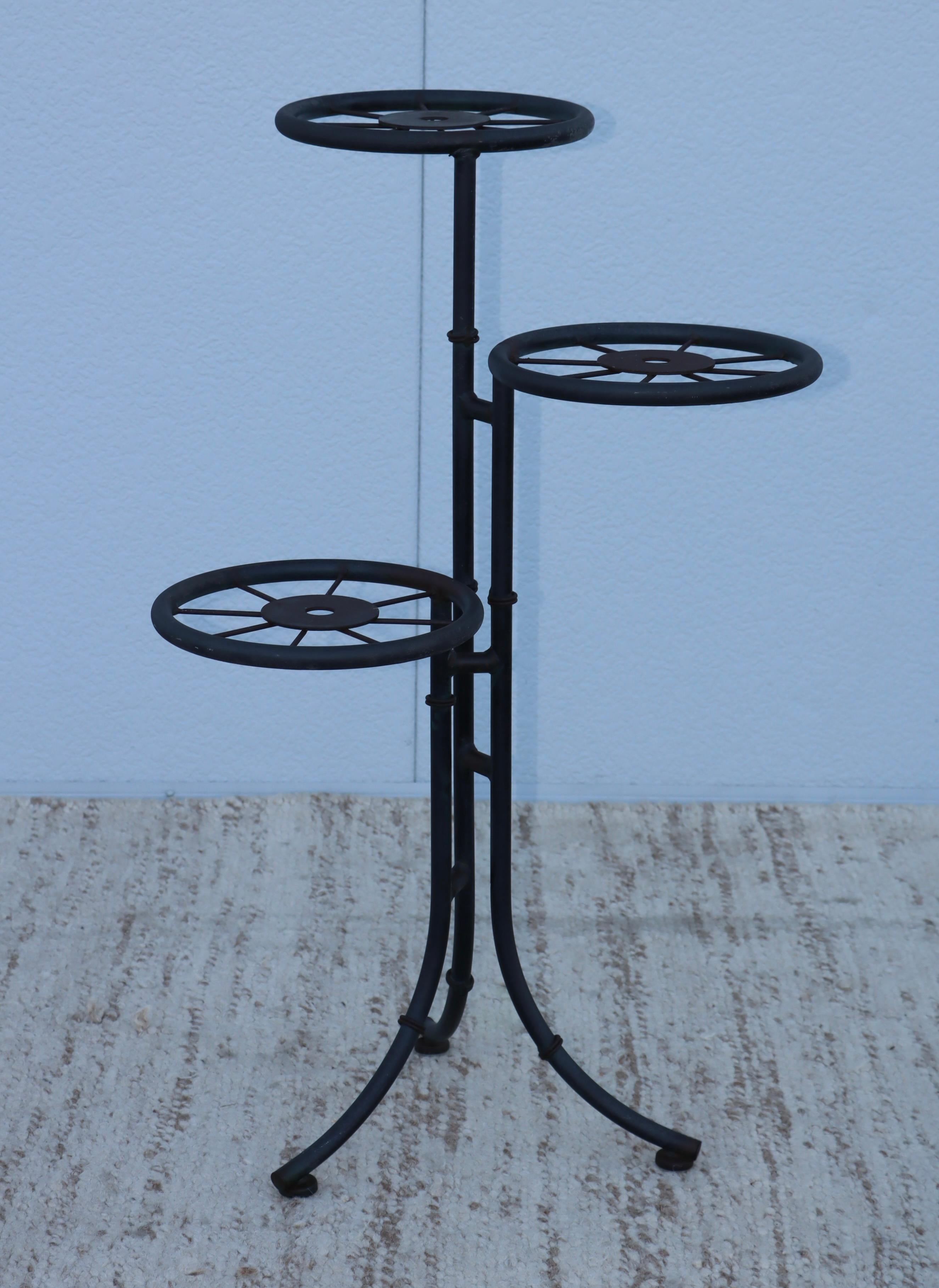 1960's 3 tier French metal plant stand, in vintage original condition with some wear and patina due to age and use.