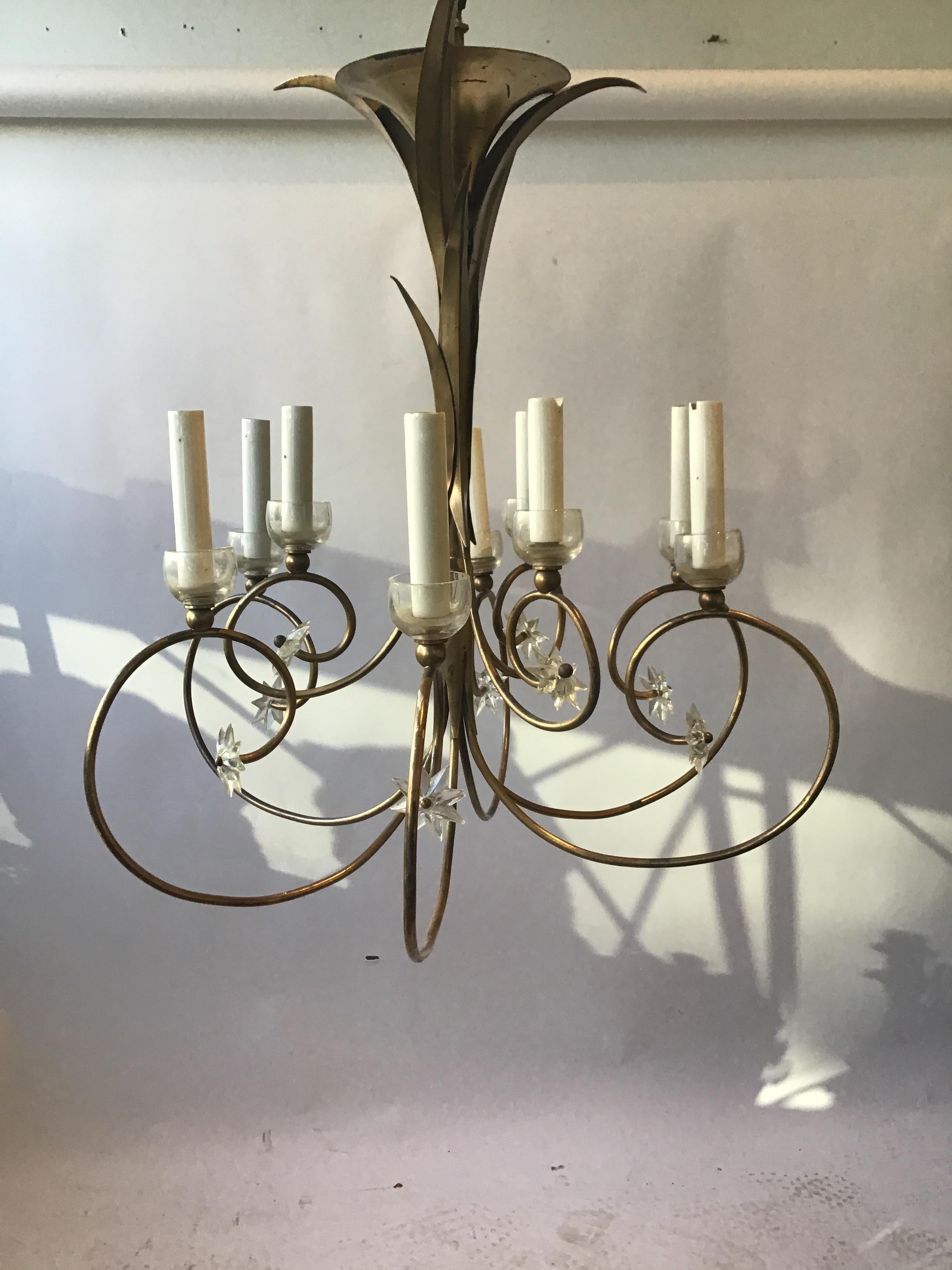 1960s French brass chandelier with plastic stars. From a Greenwich, Connecticut estate.
