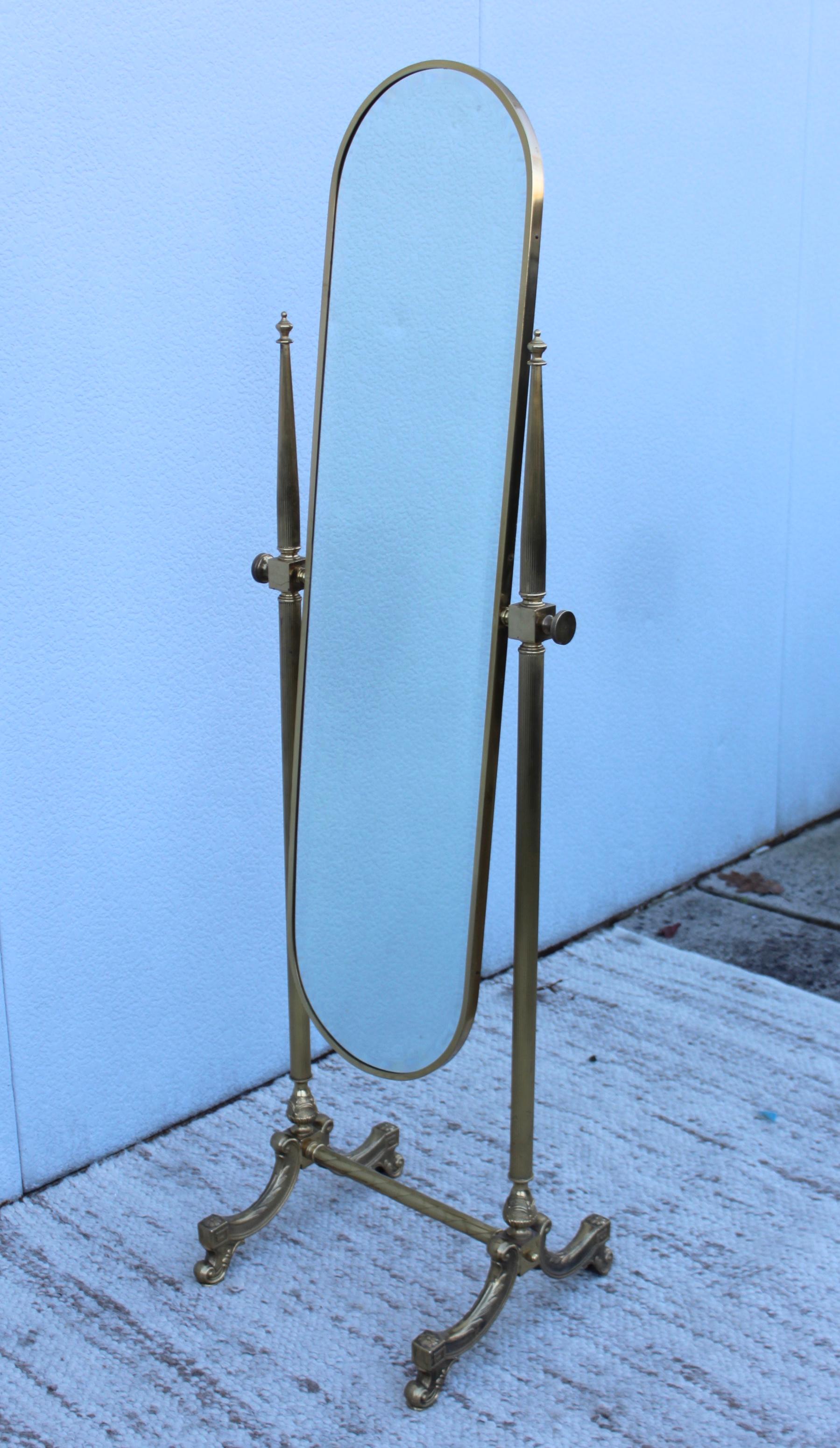 Stunning 1960s solid brass French cheval standing mirror, in vintage original condition with minor wear and patina due to age and use.