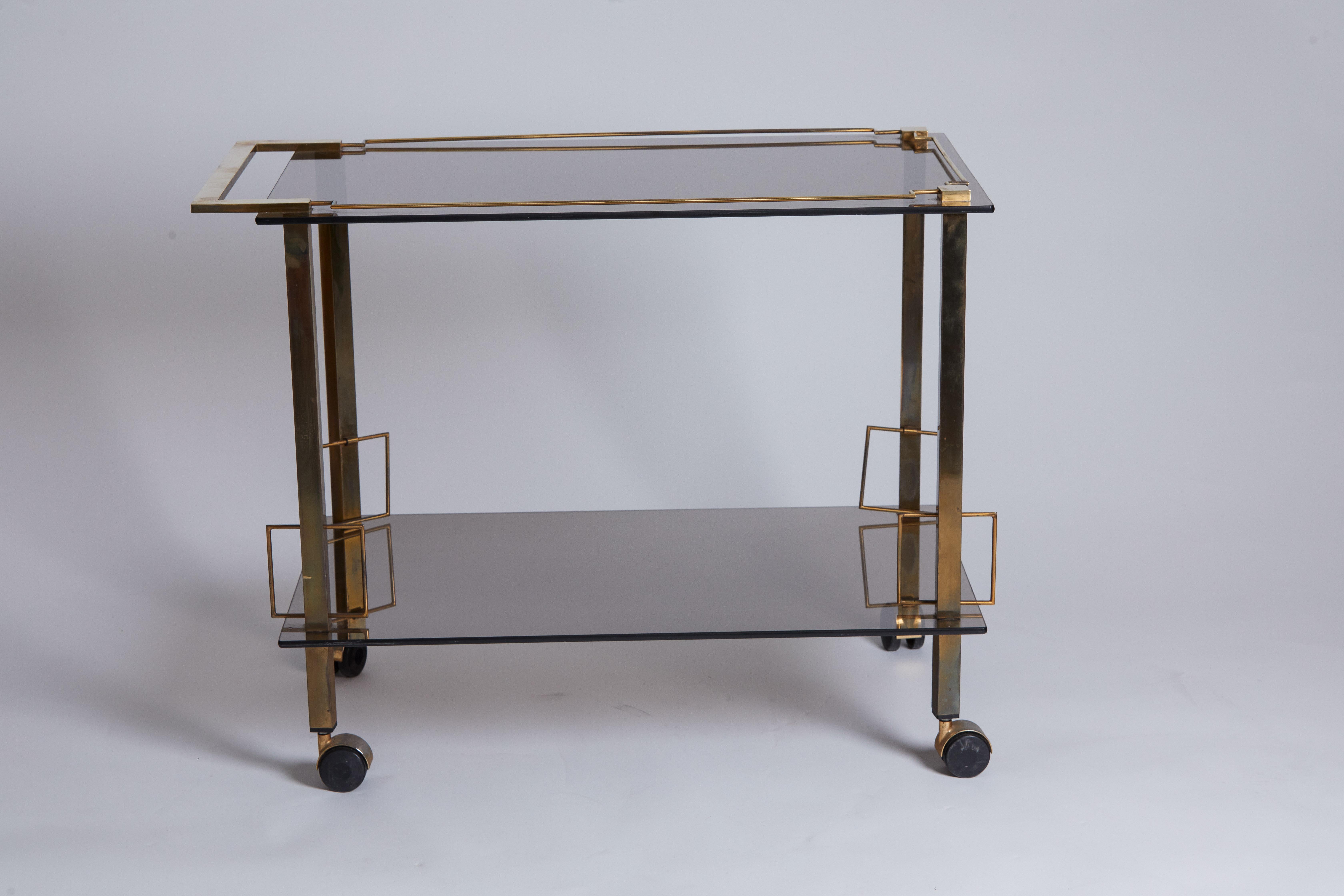 1960s French brass and smoked glass bar cart with bottle holder.
