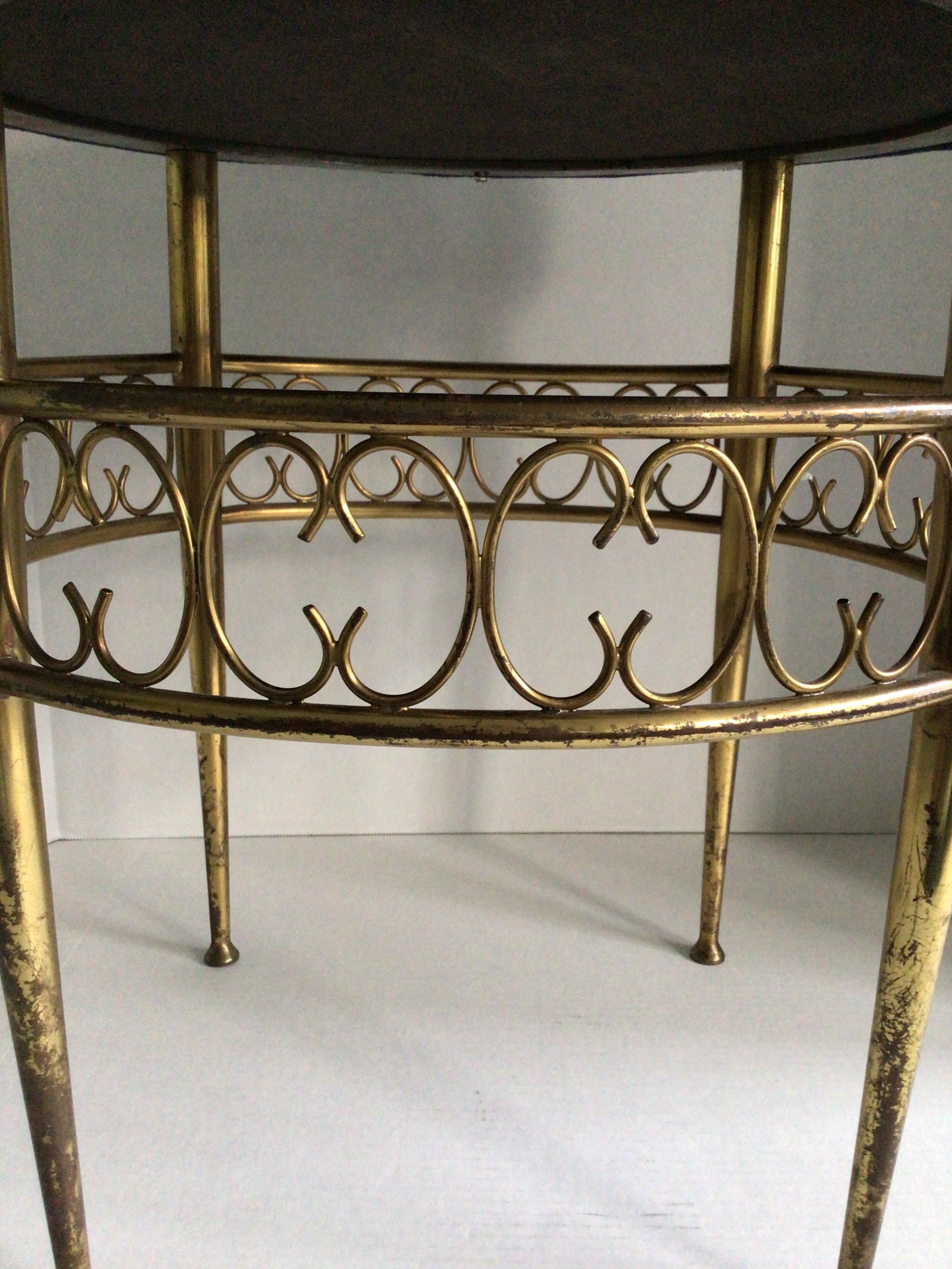 1960s French Brass Stool With Scrolls
Legs bend in per the design
Needs refinishing and reupholstery