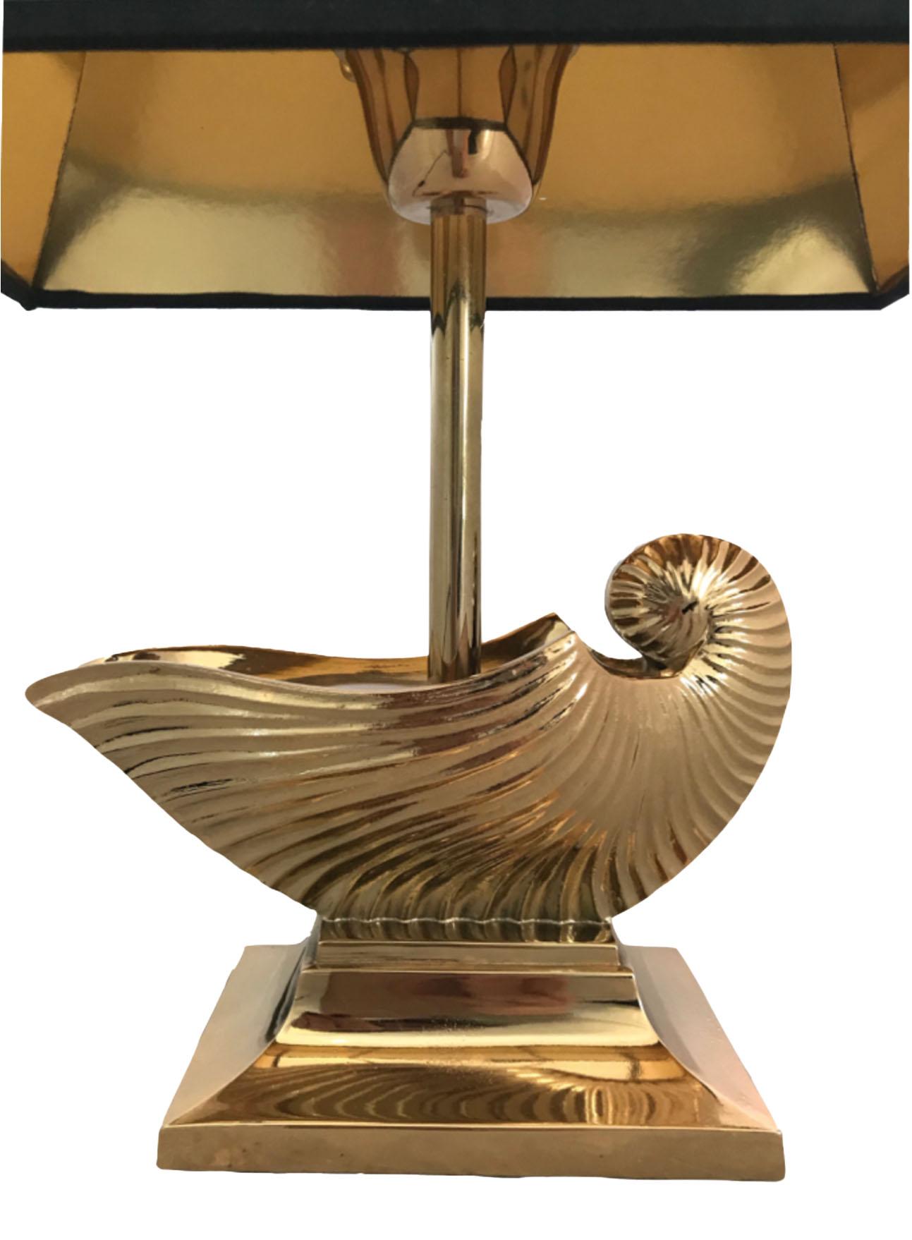 French brass metal nautilus shell table lamp Maison Charles

Black shade with gold interior is included.