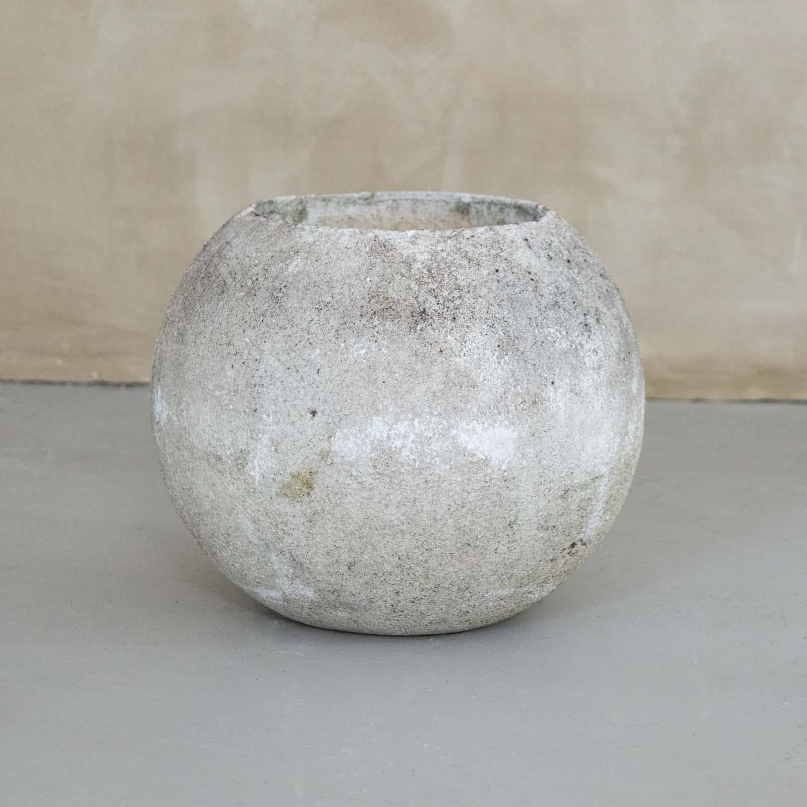 Incredible cast concrete ball planter made in France, 1960's. Vintage piece with great modern form in the style of Willy Guhl, perfect for indoor or outdoor use. Wonderful age and patina throughout. Some with moss on exterior.  Eight small size