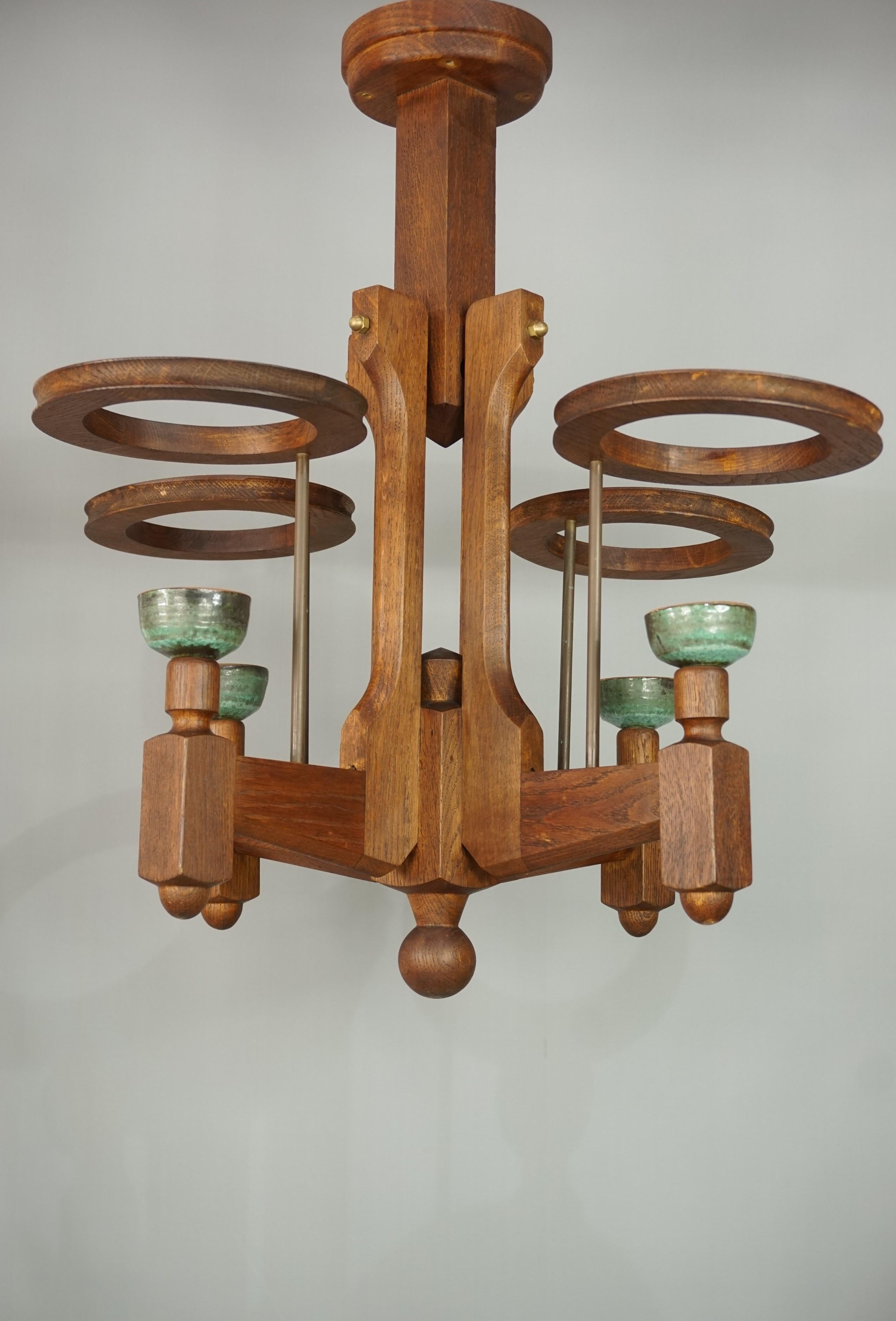 1960s French design oak and ceramics chandelier by Guillerme and Chambron.