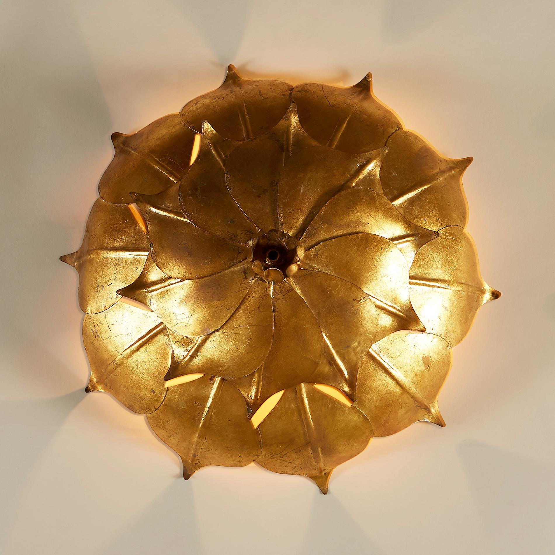 Mid-century double petal gold leaf wall light with centre bud. Exudes a lovely mood light. 