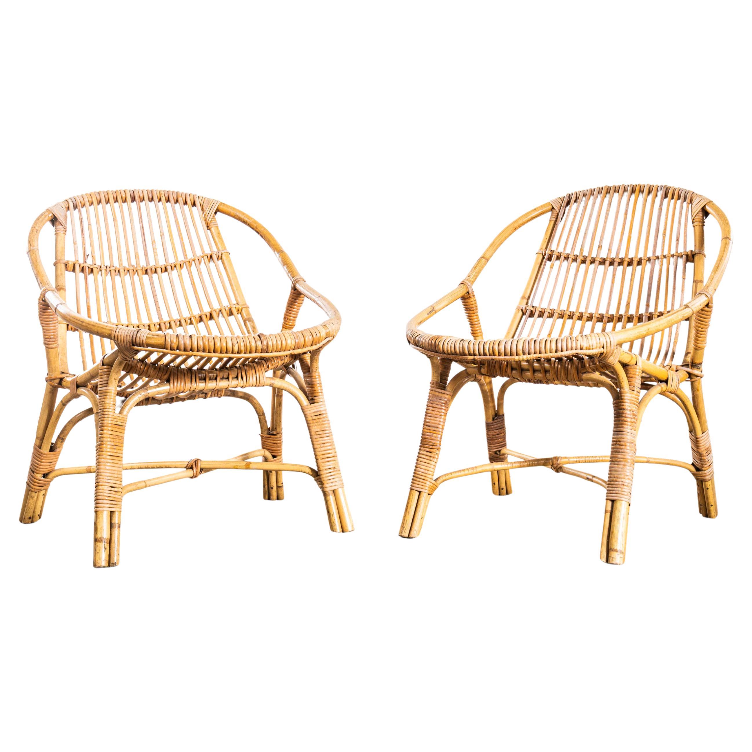 Fauteuils en rotin français à assise basse des années 1960 - Paire