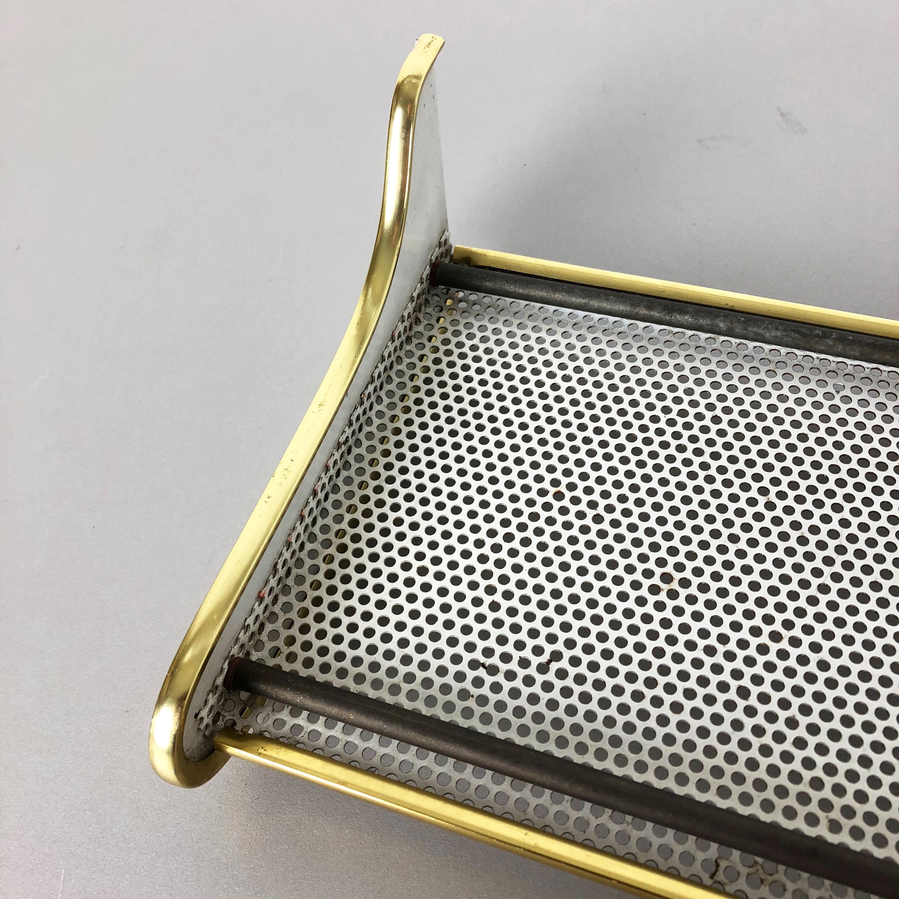 Tavola da parete in ottone 
