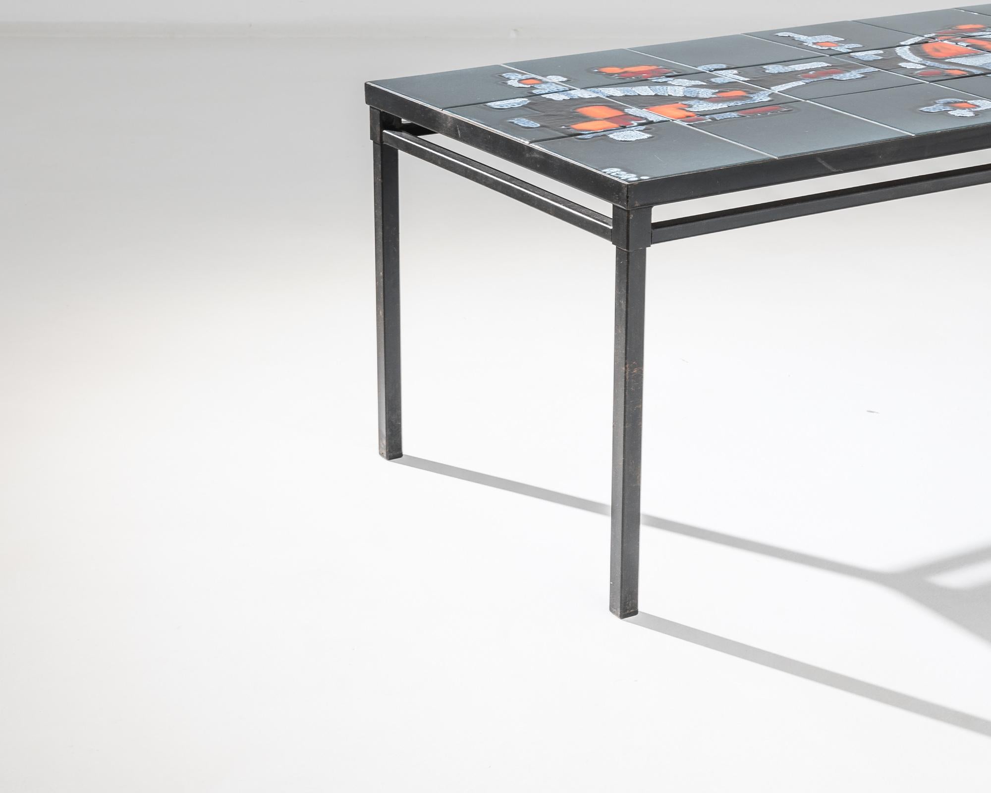 Discover a unique blend of form and function with this 1960s French Metal Coffee Table, crowned with a striking Ceramic Top. The sleek, minimalist frame crafted from robust metal provides a sturdy foundation for the intricately designed ceramic