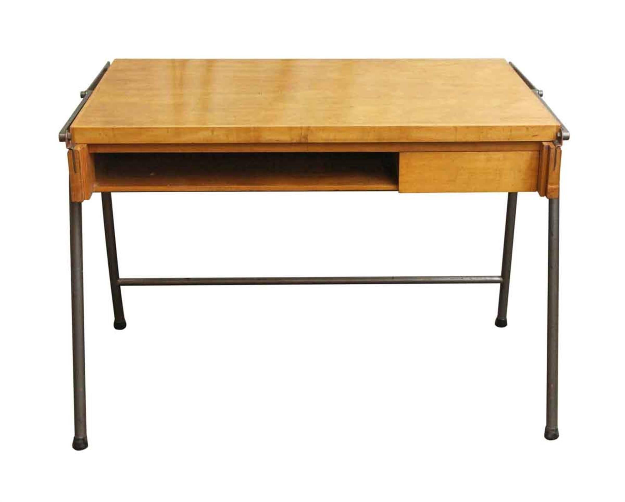 Mid-Century Modern adjustable drafting table desk from the 1960s, from French. This can be seen at our 2420 Broadway location on the upper west side in Manhattan.