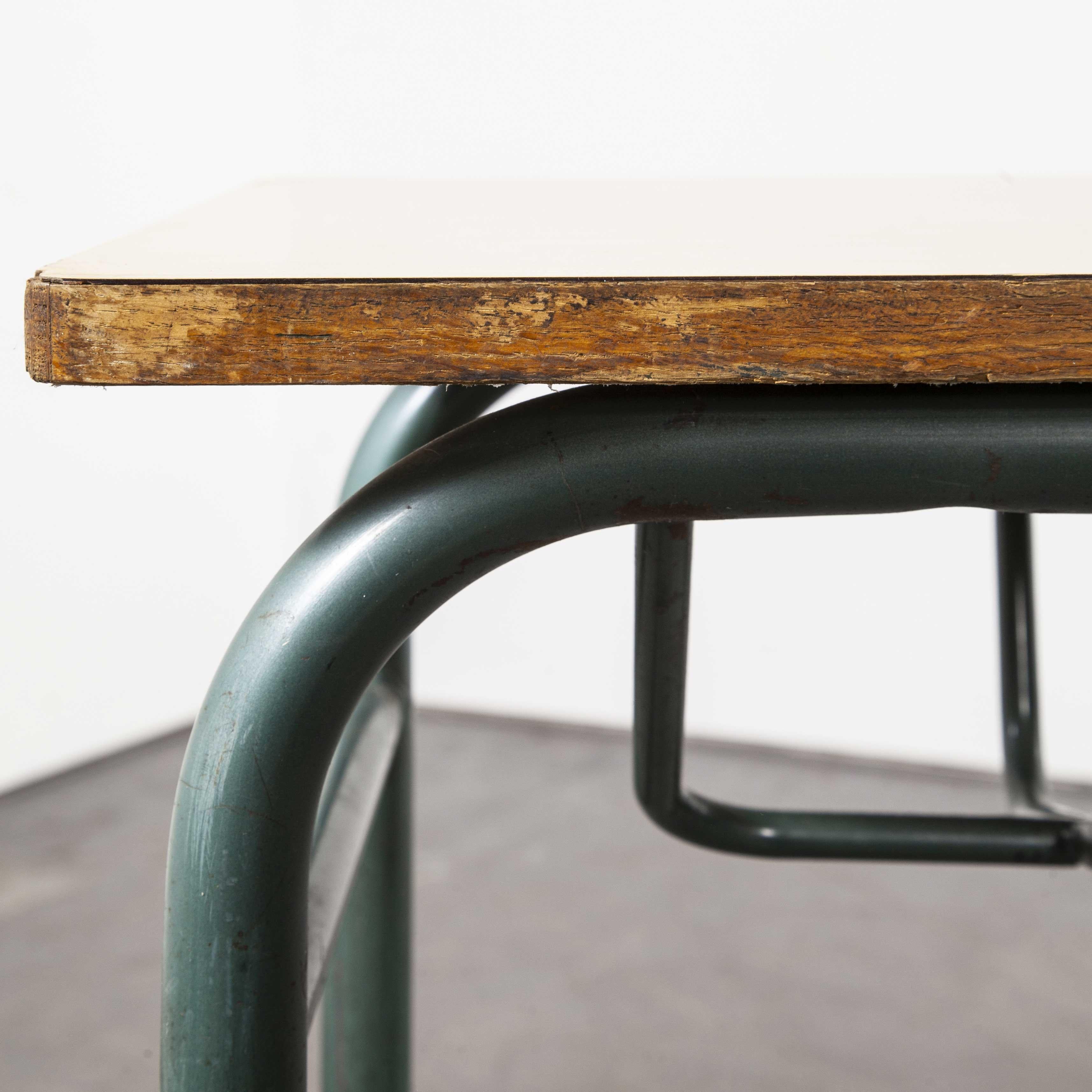 1960s French midcentury Mullca school desk - console table

1960s French midcentury Mullca school desk - console table. In 1947 Robert Muller and Gaston Cavaillon created the company that went on to develop arguably the most famous French school