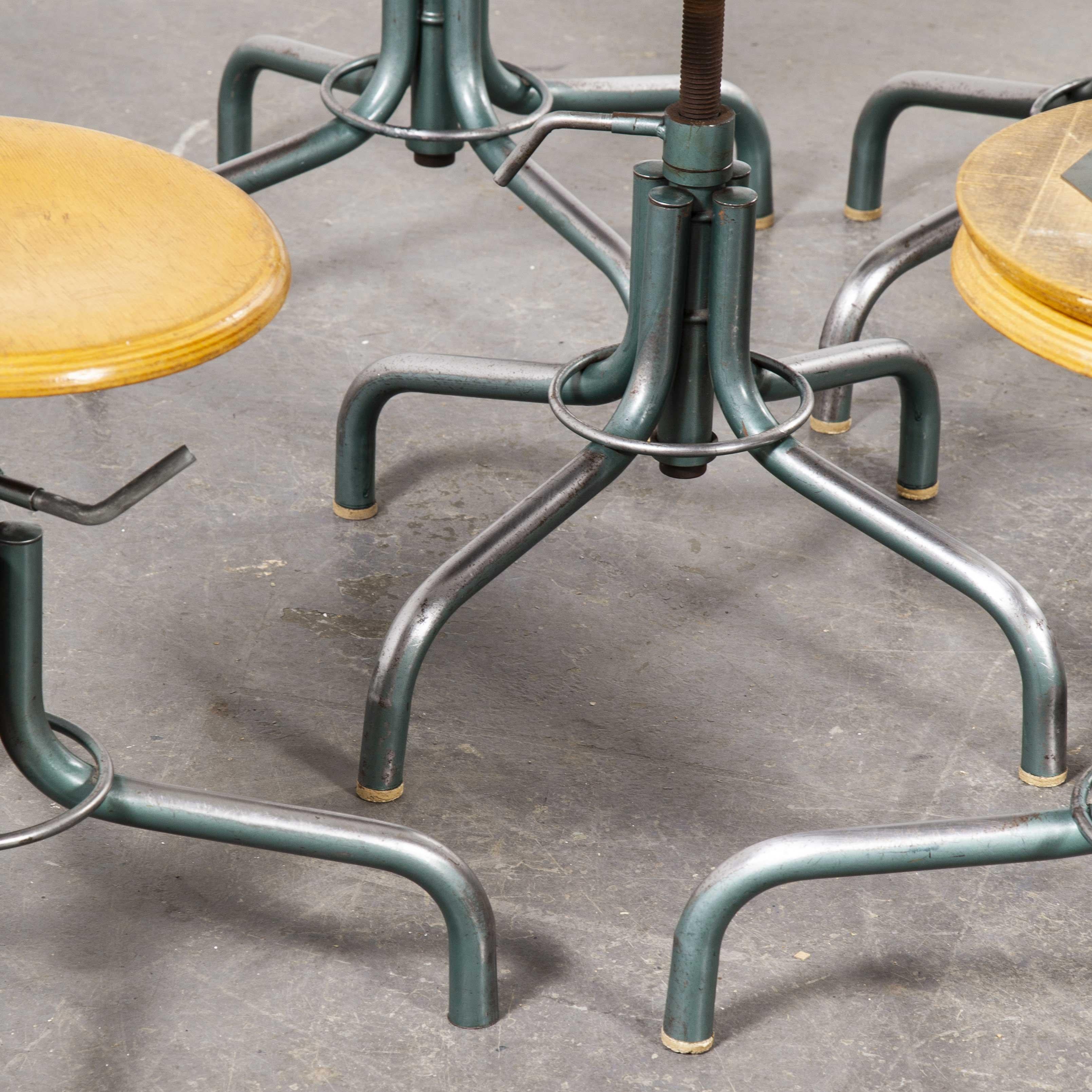 1960s French original Flambo swiveling stools. In 1926 Henri Lieber, a French Industrial designer created his first Industrial stool designed specifically to improve the comfort of women sitting in offices throughout France. Flambo is one of the