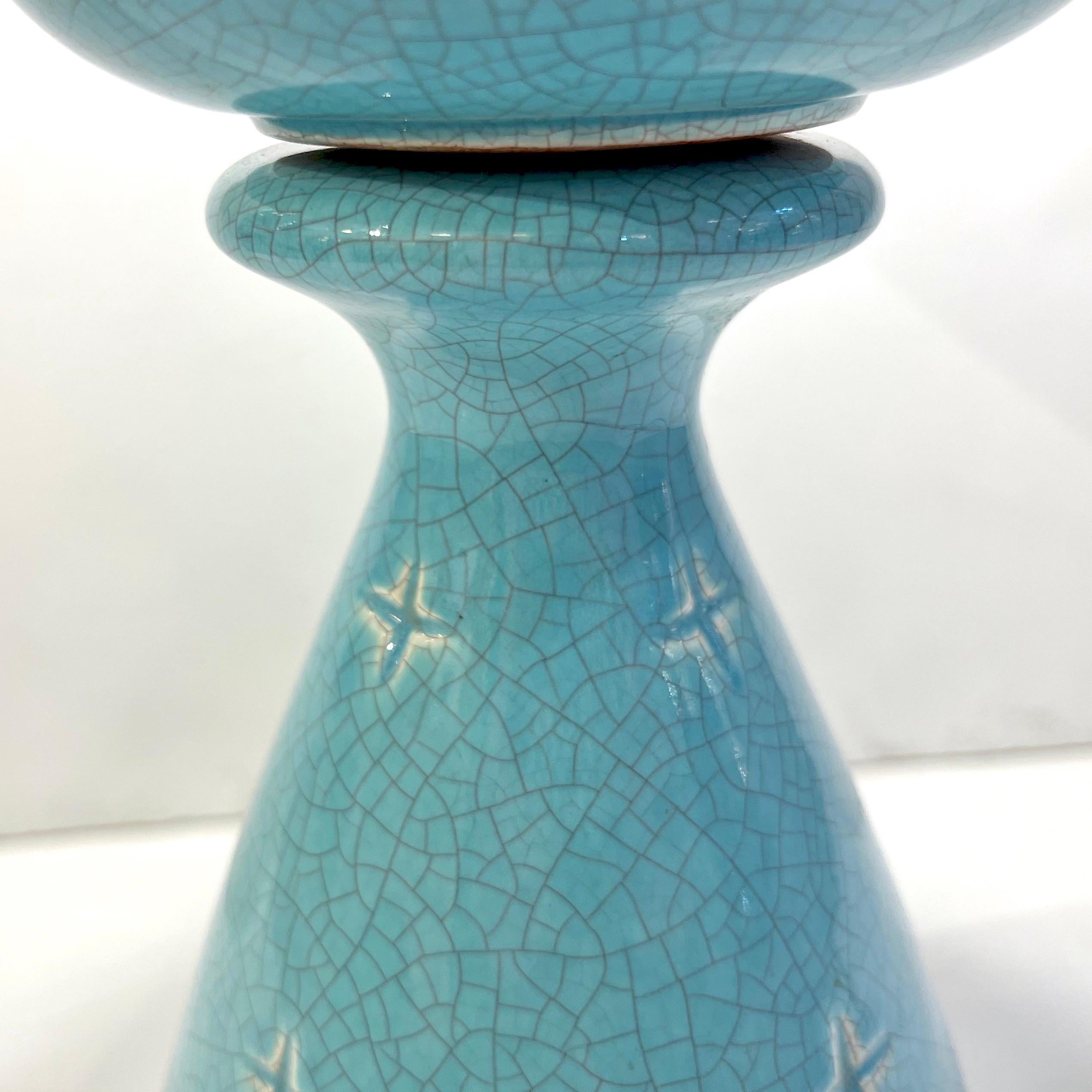 20th Century 1960s French Pair of Aquamarine Blue Craquelure Glaze Ceramic Lamps with Stars For Sale
